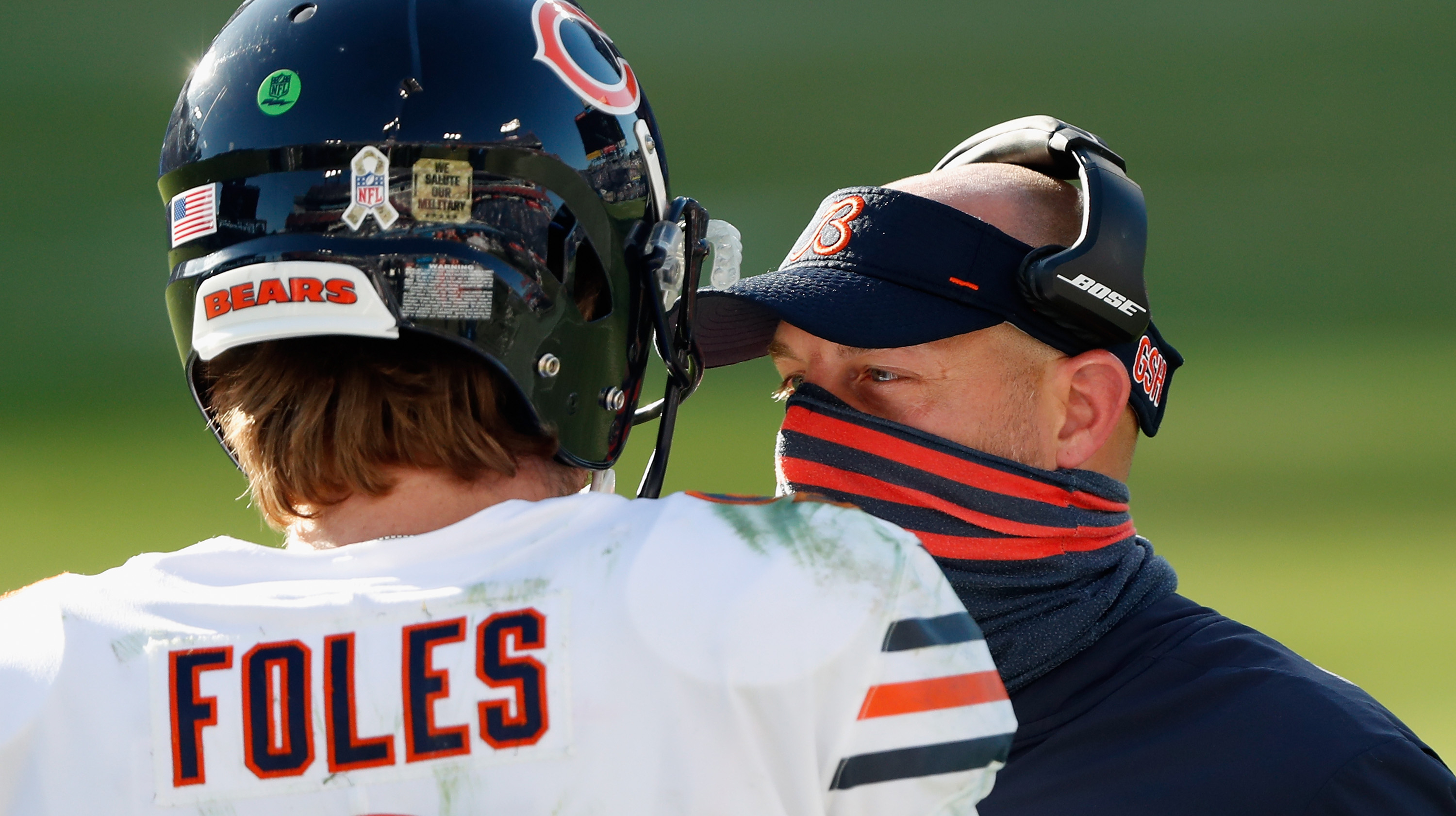 Head coach Matt Nagy of the Chicago Bears talks with quarterback Nick Foles #9 during the third quarter against the Tennessee Titans at Nissan Stadium on November 08, 2020 in Nashville, Tennessee.
