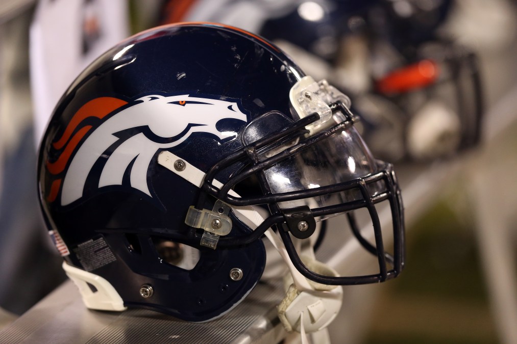 Denver Broncos helmets sit on the bench during their game against the Oakland Raiders at O.co Coliseum on December 6, 2012 in Oakland, California.