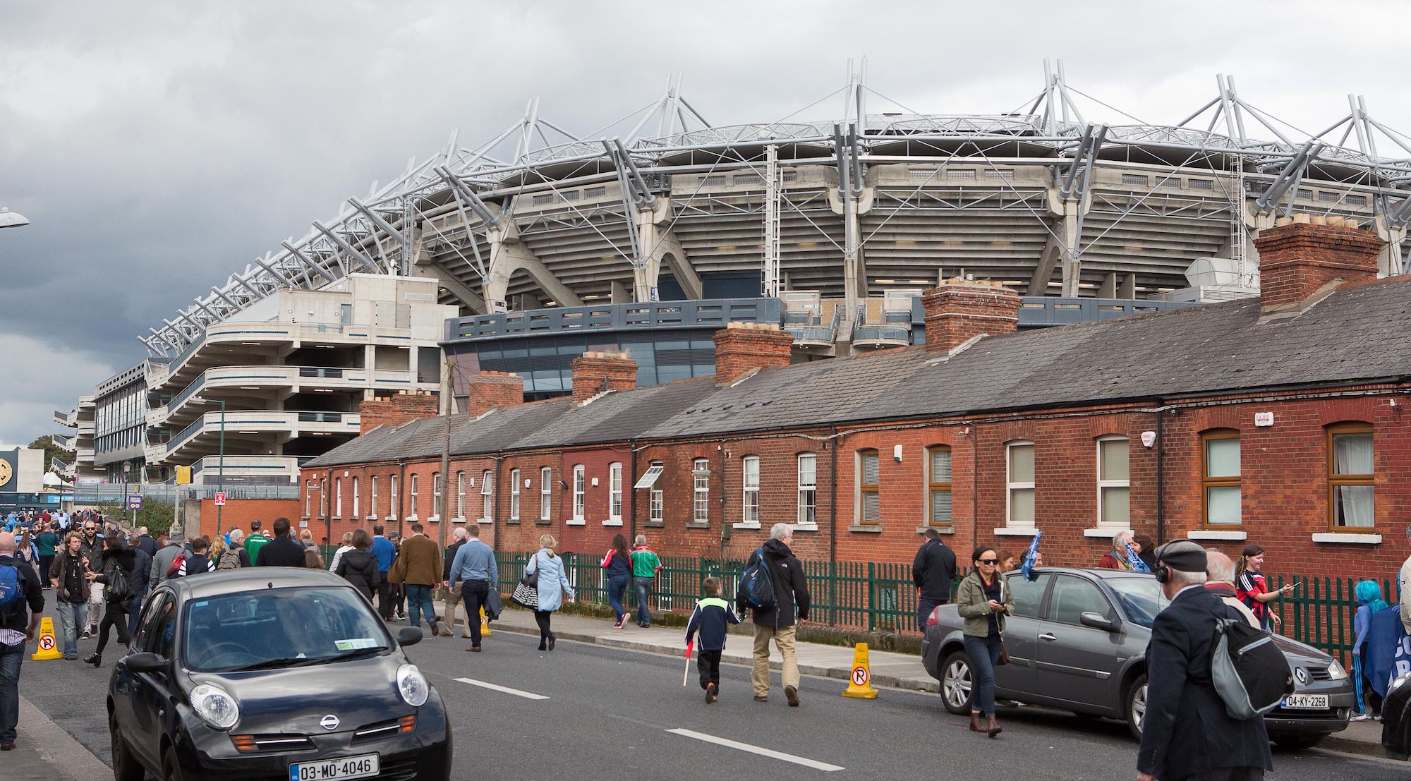 Supporters arrive outside Croke Park for the GAA All-Ireland Gaelic Football Final replay match between Dublin and Mayo at Croke Park, Dublin, Ireland, on October 1, 2016. Photo: Karl Burke/AFP. The biggest crowd in Europe on Saturday will not be watching detached professionals kissing the badge of their latest football team, but at the All-Ireland Gaelic football final. Two amateur teams, Dublin and Mayo, will attempt to win the coveted All-Ireland trophy for Gaelic football in a replay following a rare draw two weeks ago. / AFP / Karl Burke (Photo credit should read KARL BURKE/AFP via Getty Images)