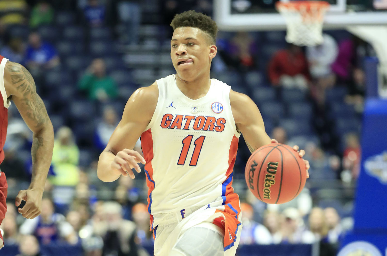 NASHVILLE, TENNESSEE - MARCH 14: Keyontae Johnson #11 of the Florida Gators dribbles the ball against the Arkansas Razorbacks during the second round of the SEC Basketball Tournament at Bridgestone Arena on March 14, 2019 in Nashville, Tennessee. (Photo by Andy Lyons/Getty Images)