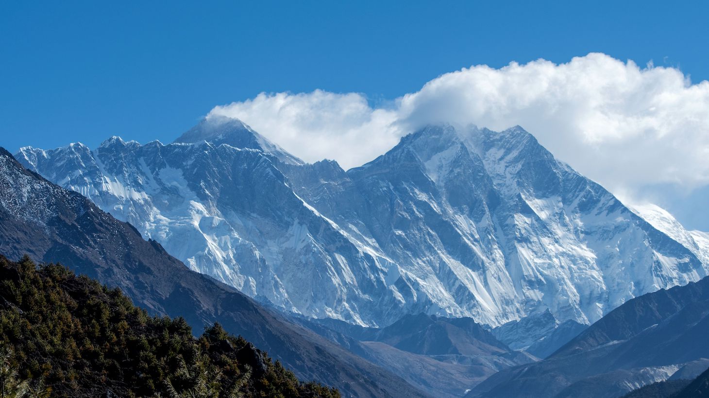 The Himalayan Mount Everest (C-L) and other mounts ranges are pictured from Namche Bazar in the Everest region, some 140 kms northeast of Kathmandu on March 26, 2020. (Photo by PRAKASH MATHEMA / AFP) (Photo by PRAKASH MATHEMA/AFP via Getty Images)