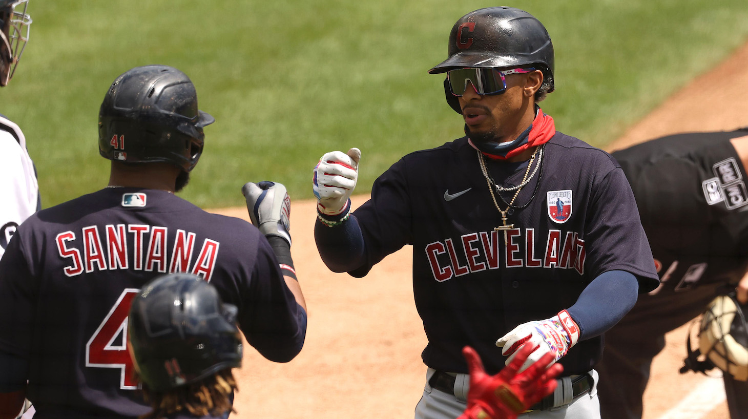 DETROIT, MICHIGAN - AUGUST 16: Francisco Lindor #12 of the Cleveland Indians celebrates his third inning two run home run with Carlos Santana #41 and Jose Ramirez #11 while playing the Detroit Tigers at Comerica Park on August 16, 2020 in Detroit, Michigan. (Photo by Gregory Shamus/Getty Images)