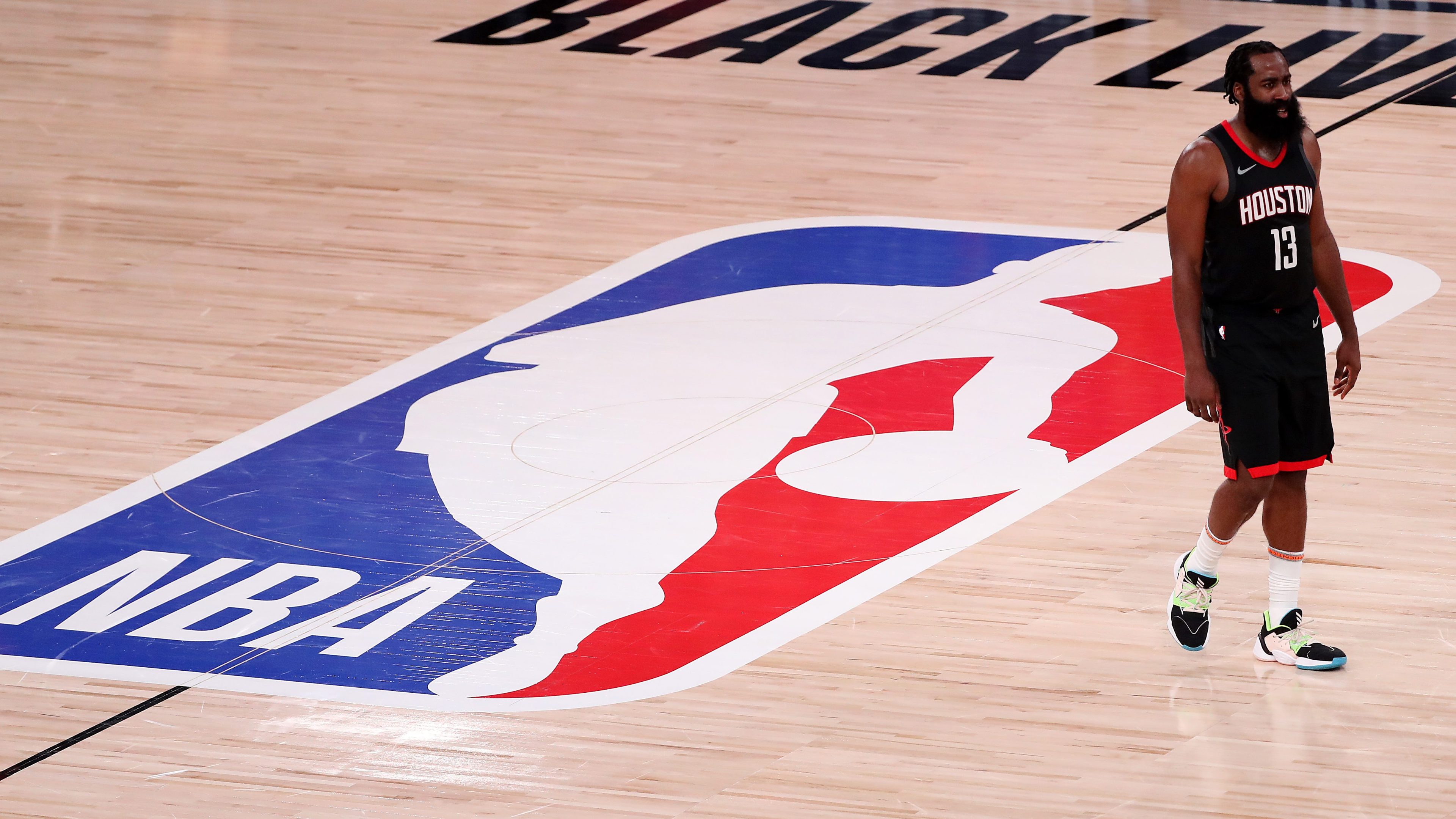 James Harden, Houston Rockets, stands near midcourt