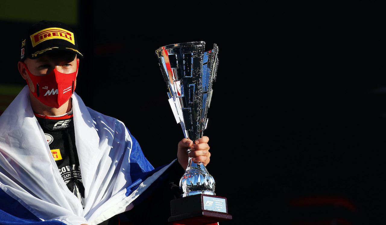 SCARPERIA, ITALY - SEPTEMBER 12: Race winner Nikita Mazepin of Russia and Hitech Grand Prix celebrates on the podium during the Formula 2 Championship Feature Race at Mugello Circuit on September 12, 2020 in Scarperia, Italy. (Photo by Mark Thompson/Getty Images)