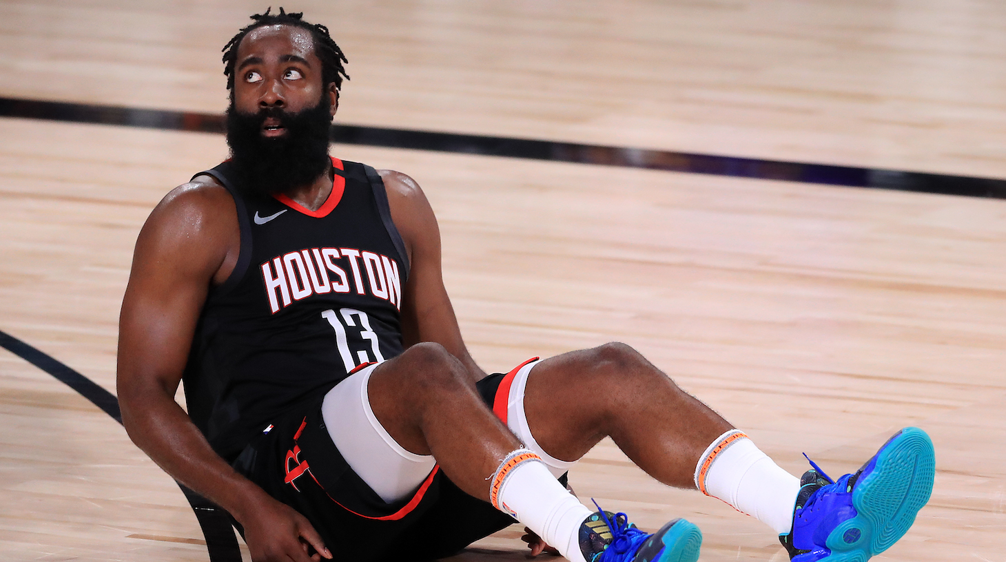 LAKE BUENA VISTA, FLORIDA - SEPTEMBER 12: James Harden #13 of the Houston Rockets reacts during the third quarter against the Los Angeles Lakers in Game Five of the Western Conference Second Round during the 2020 NBA Playoffs at AdventHealth Arena at the ESPN Wide World Of Sports Complex on September 12, 2020 in Lake Buena Vista, Florida. NOTE TO USER: User expressly acknowledges and agrees that, by downloading and or using this photograph, User is consenting to the terms and conditions of the Getty Images License Agreement. (Photo by Michael Reaves/Getty Images)