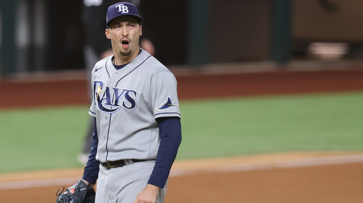 ARLINGTON, TEXAS - OCTOBER 27: Blake Snell #4 of the Tampa Bay Rays reacts as he is being taken out of the game against the Los Angeles Dodgers during the sixth inning in Game Six of the 2020 MLB World Series at Globe Life Field on October 27, 2020 in Arlington, Texas. (Photo by Tom Pennington/Getty Images)