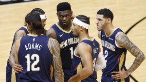 Zion Williamson and New Orleans Pelicans teammates huddle on the court
