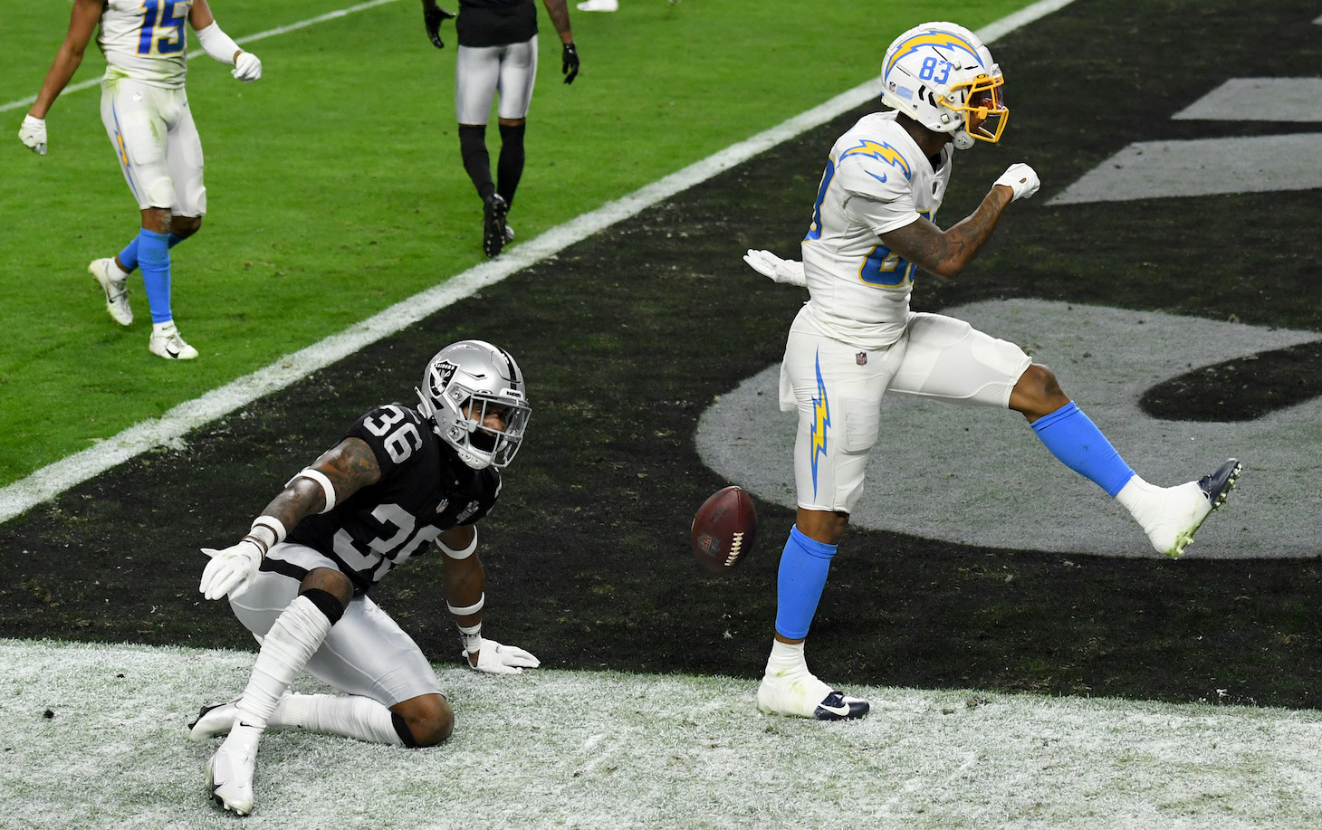 LAS VEGAS, NEVADA - DECEMBER 17: Wide receiver Tyron Johnson #83 of the Los Angeles Chargers celebrates after scoring a 26-yard touchdown against Daryl Worley #36 of the Las Vegas Raiders during the first half of their game at Allegiant Stadium on December 17, 2020 in Las Vegas, Nevada. The Chargers defeated the Raiders 30-27 in overtime. (Photo by Ethan Miller/Getty Images)