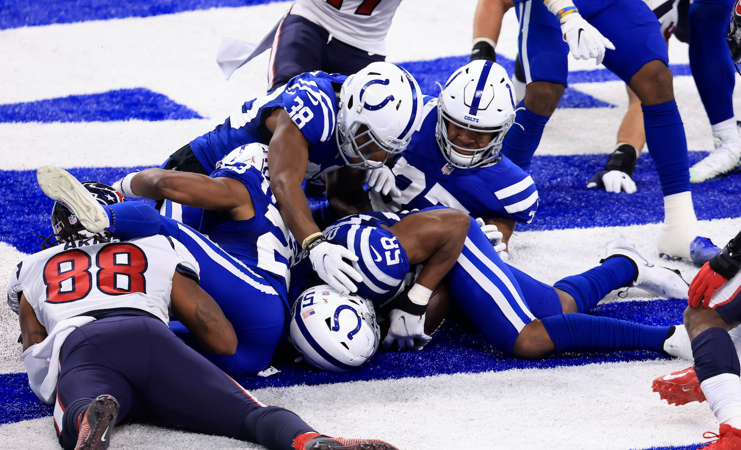 INDIANAPOLIS, INDIANA - DECEMBER 20: Bobby Okereke #58 of the Indianapolis Colts recovers a fumble in the end zone in the game against the Houston Texans during the fourth quarter at Lucas Oil Stadium on December 20, 2020 in Indianapolis, Indiana. (Photo by Justin Casterline/Getty Images)