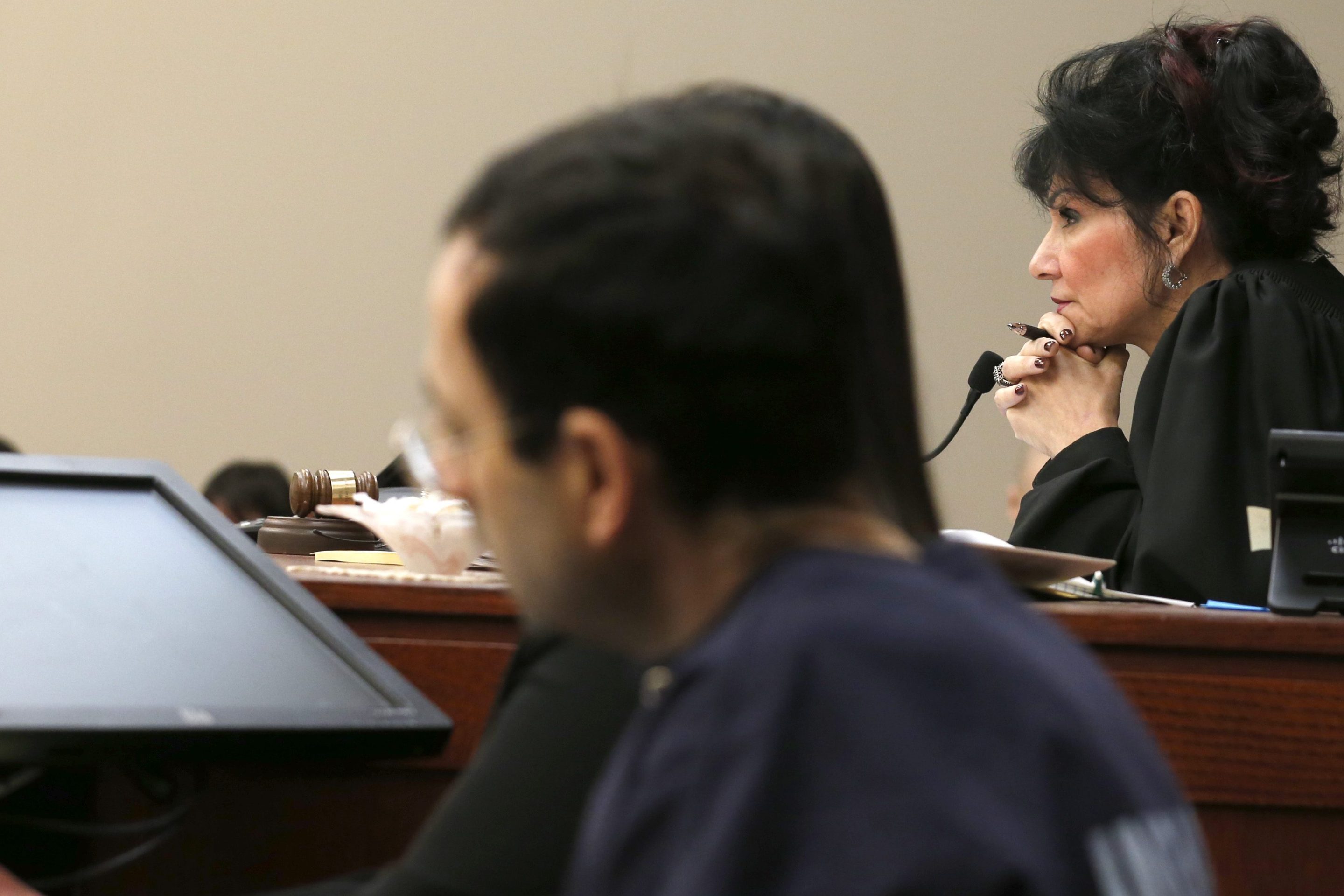 Judge Rosemarie Aquilina watches as Former Michigan State University and USA Gymnastics doctor Larry Nassar listens to impact statements during the sentencing phase in Ingham County Circuit Court on January 24, 2018 in Lansing, Michigan.