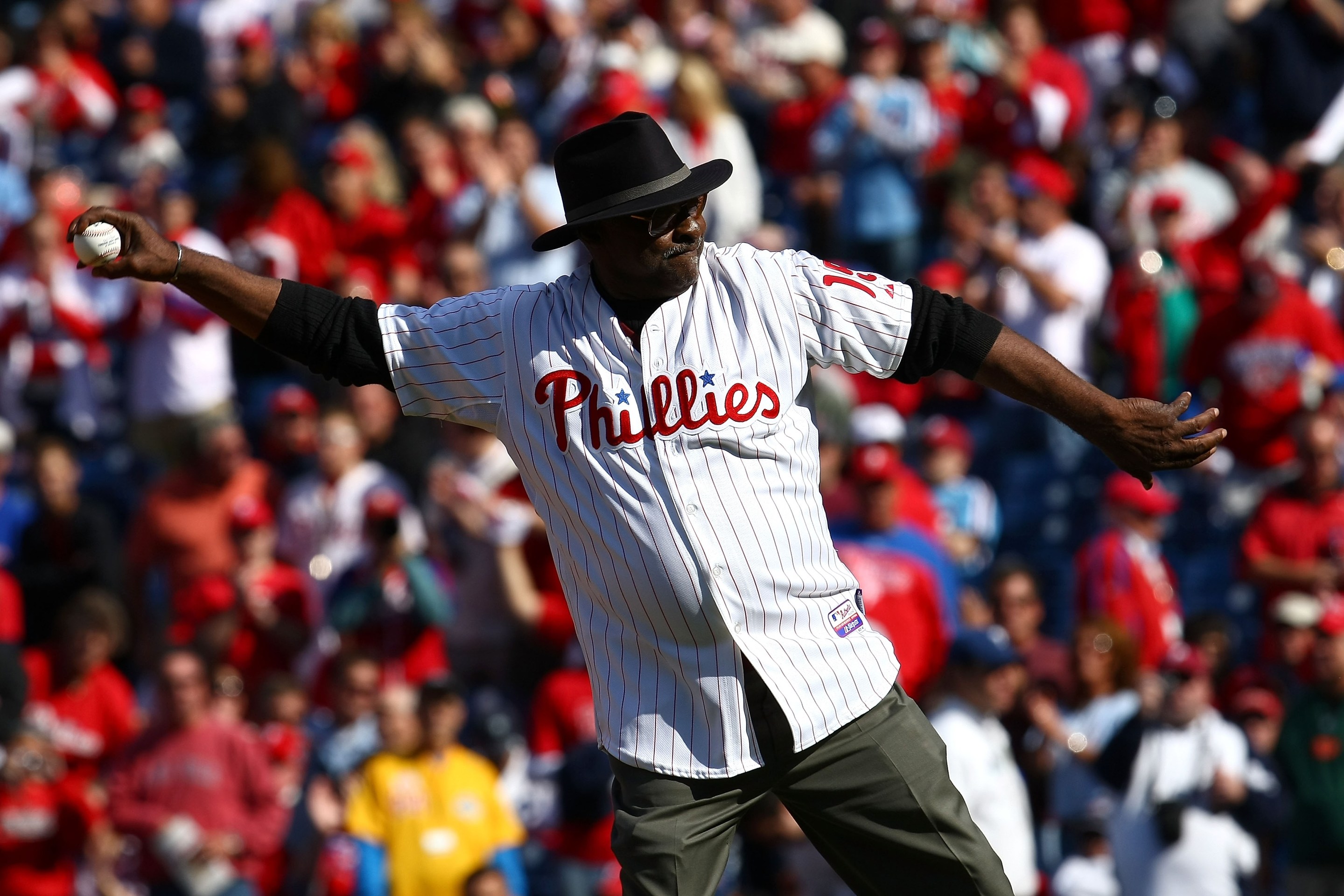 Dick Allen, stylish to the last, throws out the first pitch at a Phillies game in 2009.
