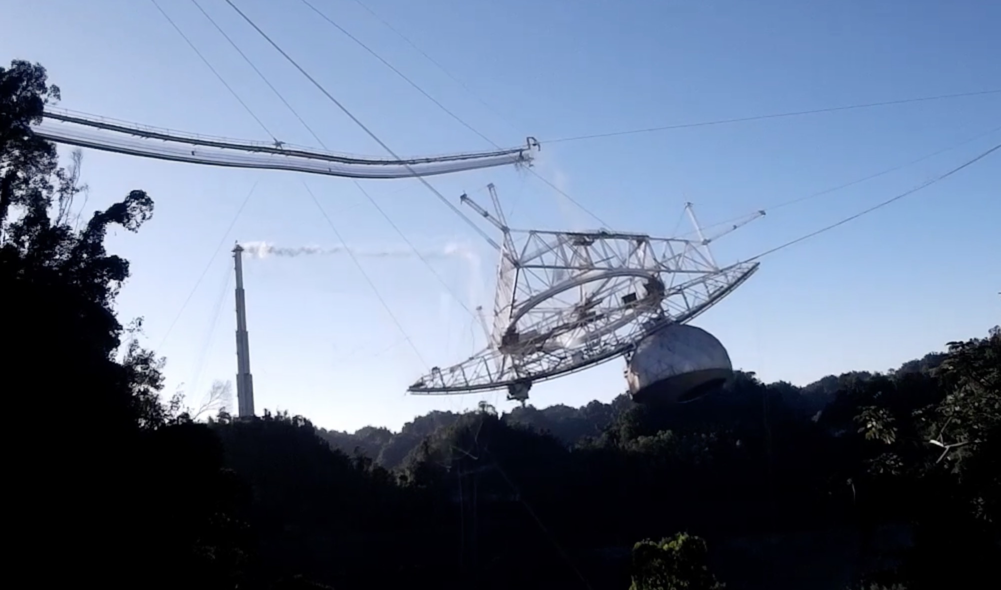 On-the-ground footage shows a cable snapping, sending the platform crashing to the ground.