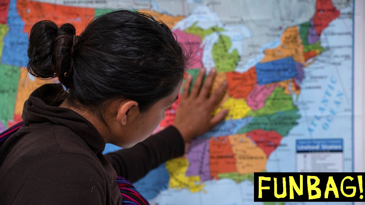 A Guatemalan woman touches a map of the United States at the Casa del Refugiado, or The House of Refugee, a new centre opened by the Annunciation House to help the large flow of migrants being released by the United States Border Patrol and Immigration and Customs Enforcement in El Paso, Texas on April 24, 2019. - The 125,000 foot space will accomodate about 500 migrants, with plans to expand for up to 1,500. While this is larger then other centres in the El Paso area, Father Ruben Garcia the director of Annunciation house says that they will still rely on churches around the community for help housing migrants. According to the CBP, border patrol agents apprehended 92,607 people along the southwest border in March, up from 66,884 in February. US President Donald Trump, who has made immigration the core of his message to his conservative base, said on Twitter that "a very big Caravan of over 20,000 people" is making its way through Mexico toward the United States. (Photo by Paul Ratje / AFP) (Photo credit should read PAUL RATJE/AFP via Getty Images)