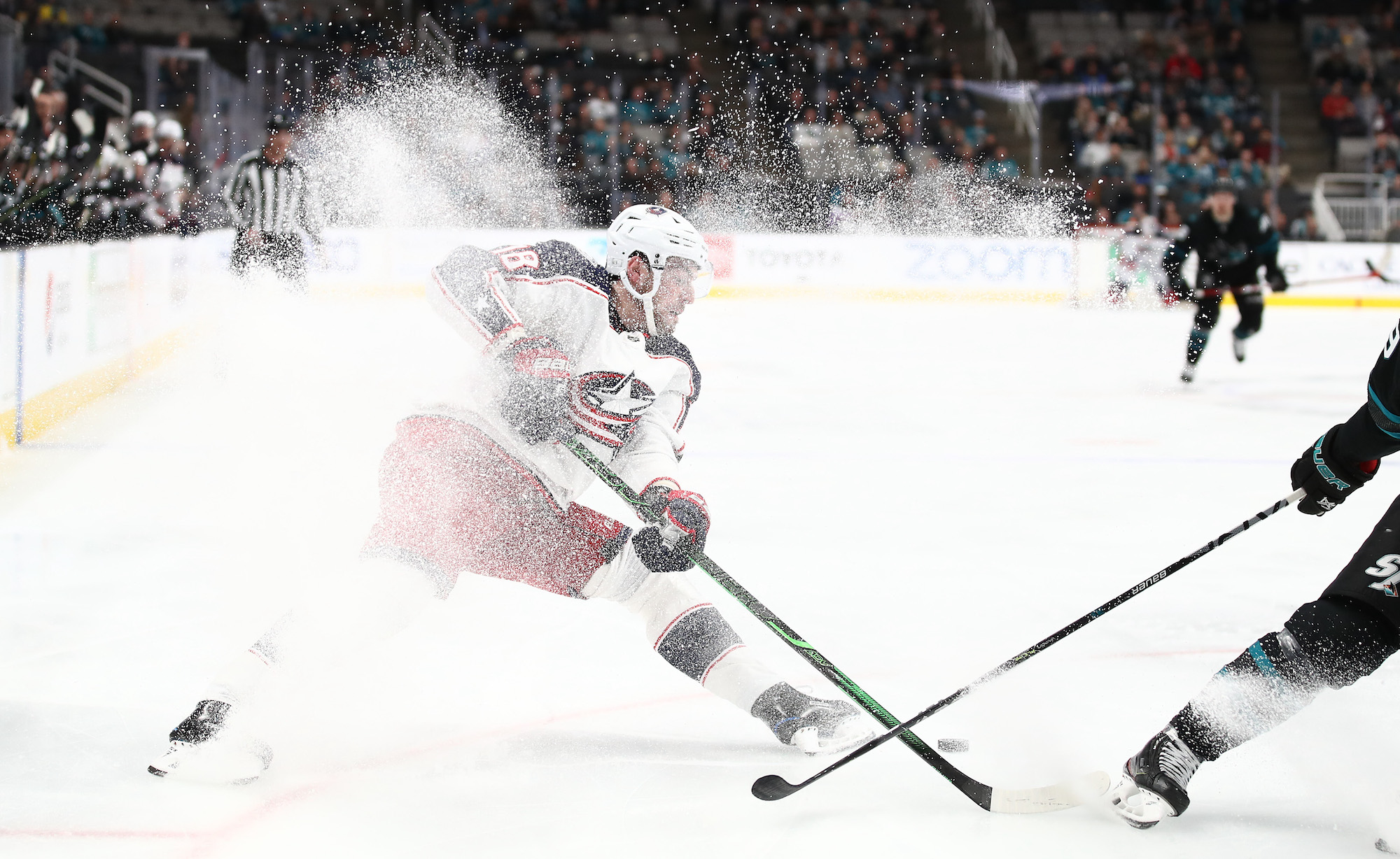 SAN JOSE, CALIFORNIA - JANUARY 09: Pierre-Luc Dubois #18 of the Columbus Blue Jackets stops on the ice during their game against the San Jose Sharks at SAP Center on January 09, 2020 in San Jose, California. (Photo by Ezra Shaw/Getty Images)
