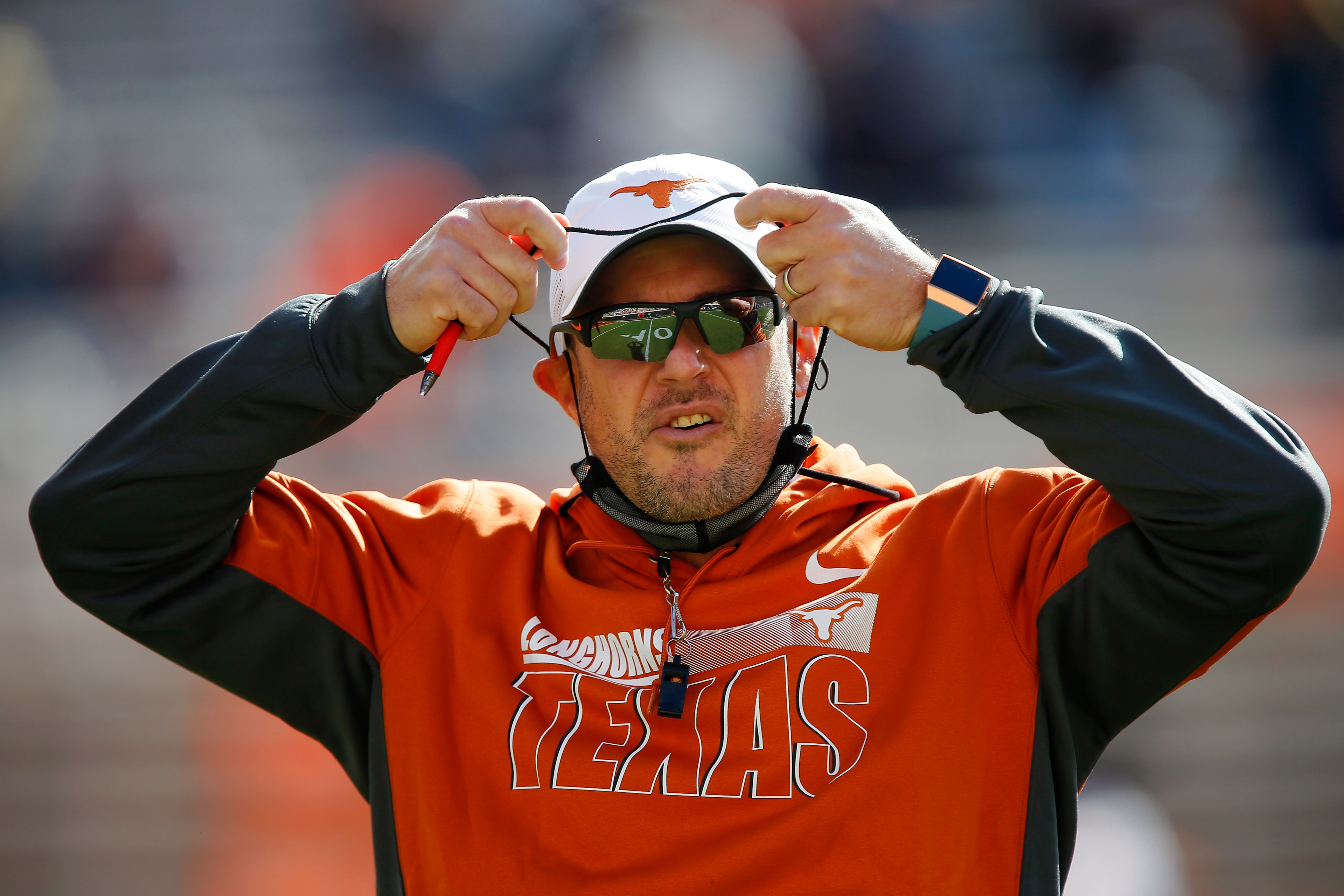 Tom Herman of the Texas Longhorns prepares for a game
