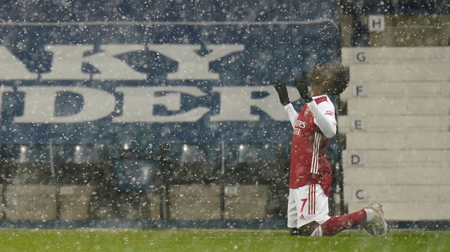 Arsenal's English striker Bukayo Saka celebrates scoring their second goal during the English Premier League football match between West Bromwich Albion and Arsenal at The Hawthorns stadium in West Bromwich, central England, on January 2, 2021.