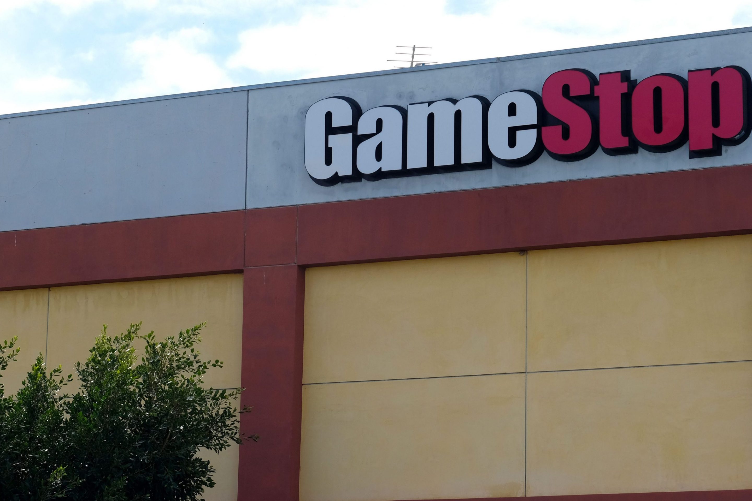 A Game Stop sign on a building