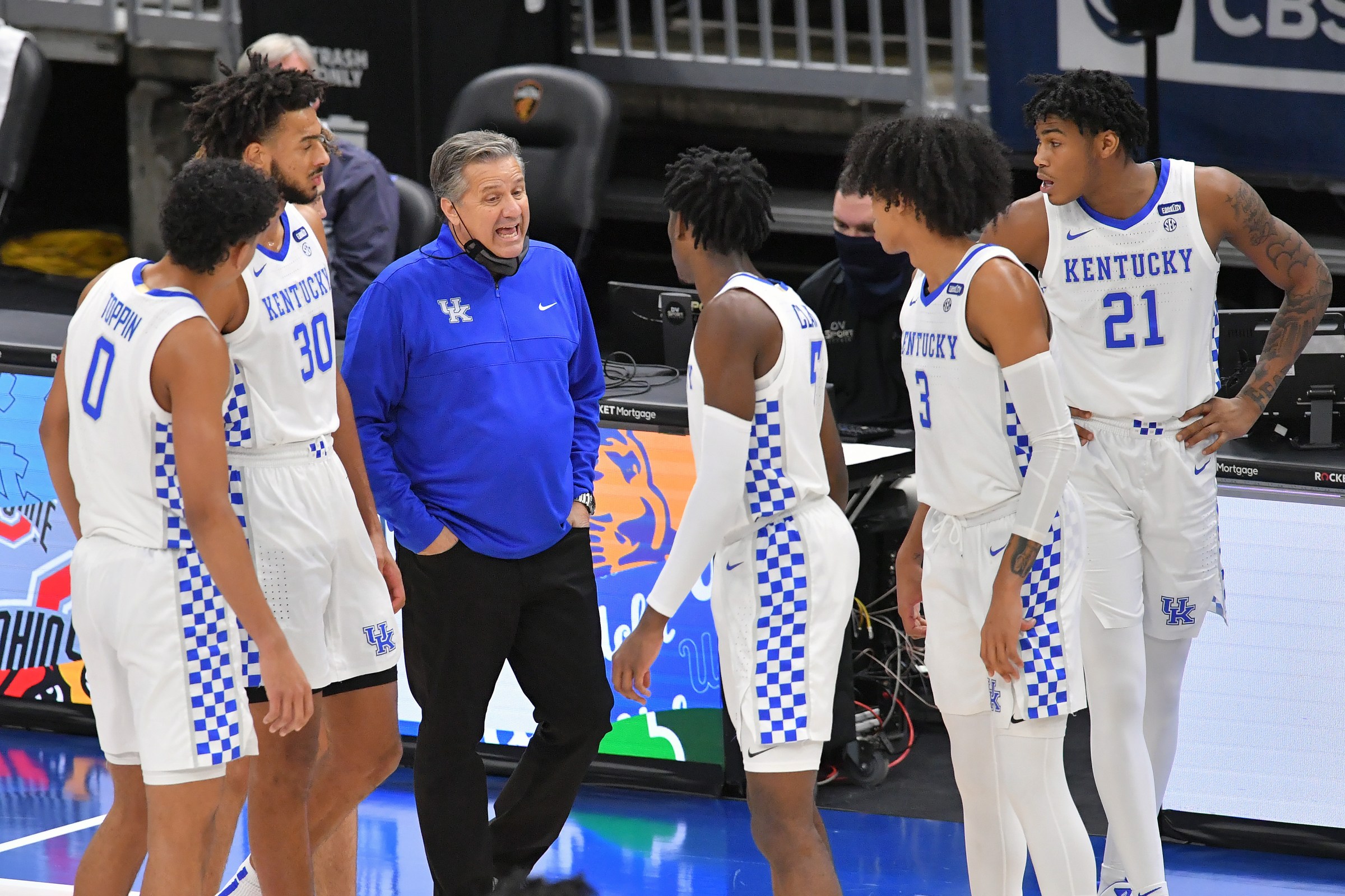 Head coach John Calipari of the Kentucky Wildcats talks to his players during a time-out during the second half against the North Carolina Tar Heels at Rocket Mortgage Fieldhouse on December 19, 2020 in Cleveland, Ohio. The Tar Heels defeated the Wildcats 75-63.