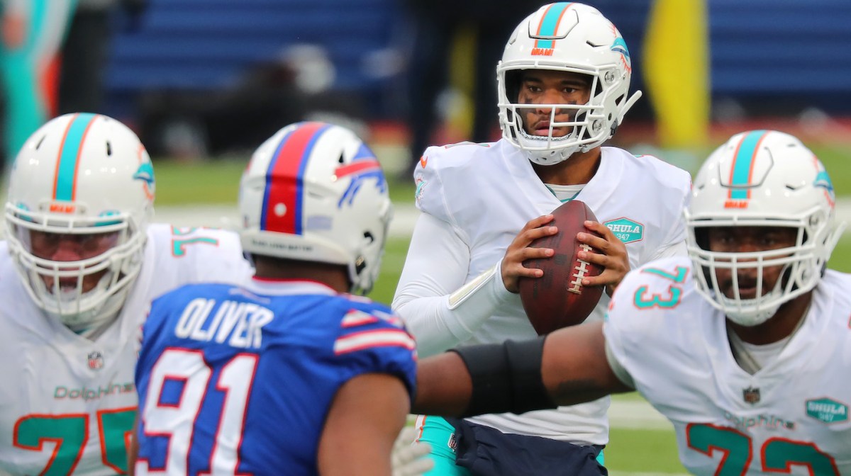 ORCHARD PARK, NEW YORK - JANUARY 03: Tua Tagovailoa #1 of the Miami Dolphins looks to pass against the Buffalo Bills during the first quarter at Bills Stadium on January 03, 2021 in Orchard Park, New York. (Photo by Timothy T Ludwig/Getty Images)