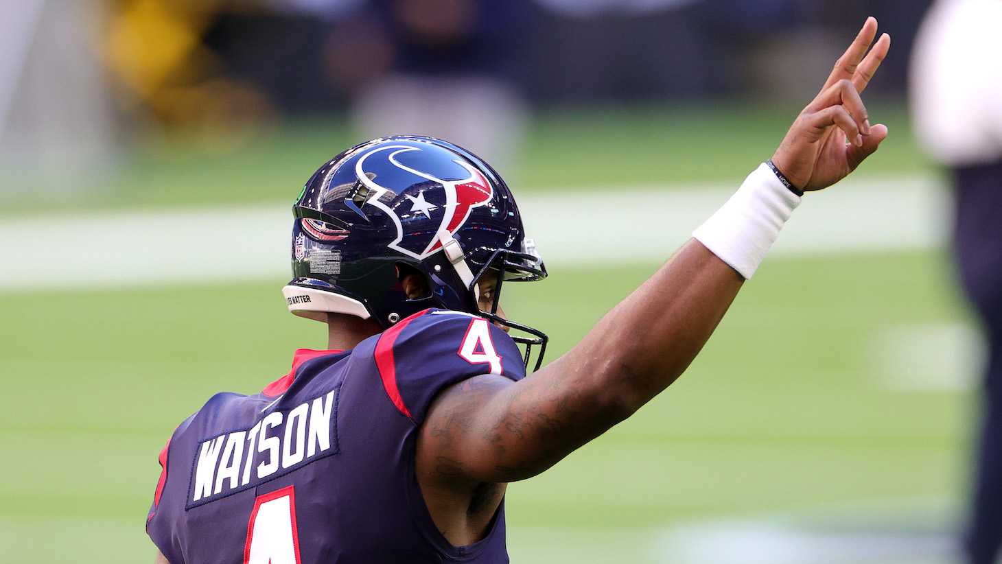 HOUSTON, TEXAS - JANUARY 03: Deshaun Watson #4 of the Houston Texans in action against the Tennessee Titans during a game at NRG Stadium on January 03, 2021 in Houston, Texas. (Photo by Carmen Mandato/Getty Images)