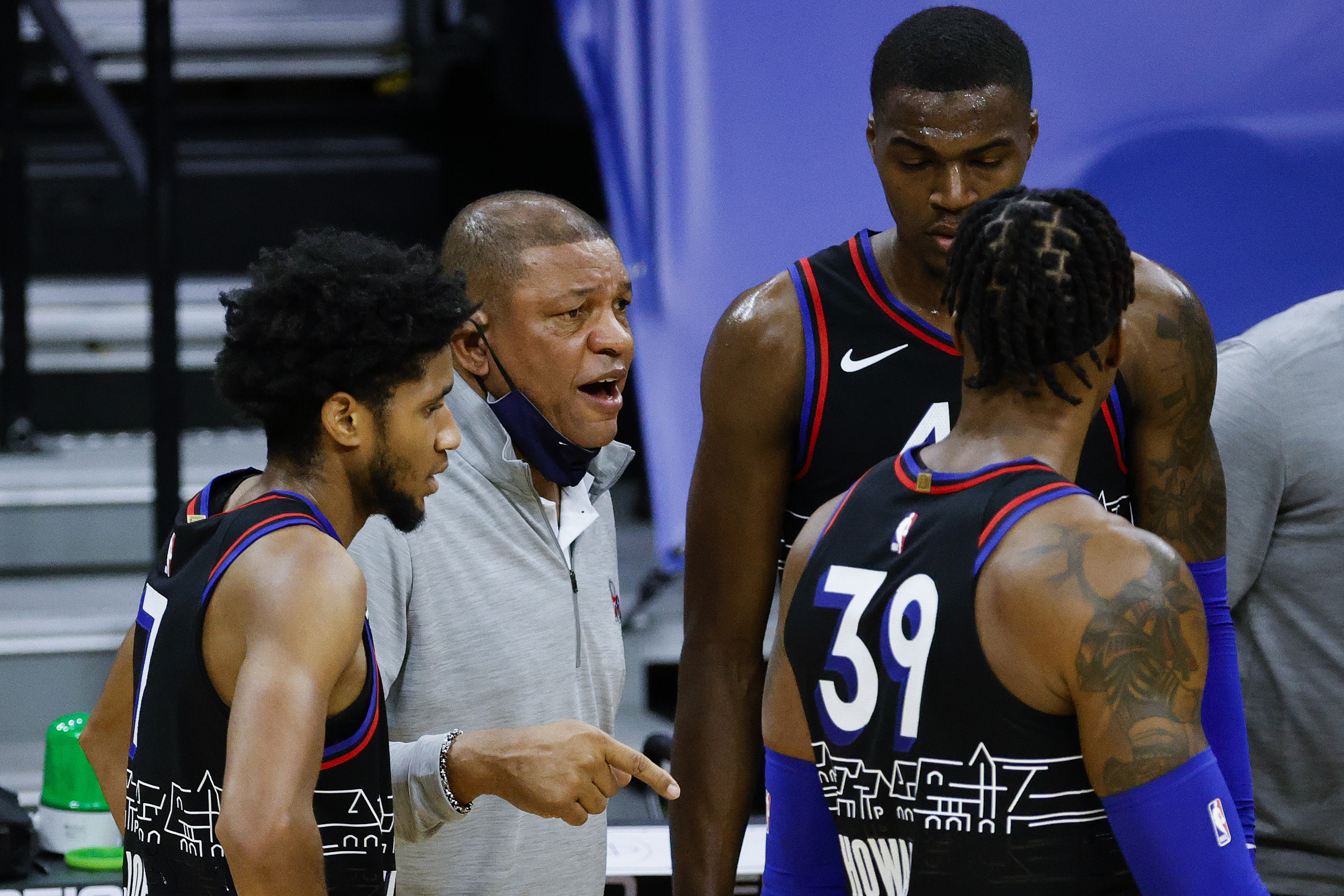 Head coach Doc Rivers speaks to players during the second quarter against the Denver Nuggets at Wells Fargo Center on January 09, 2021 in Philadelphia, Pennsylvania.