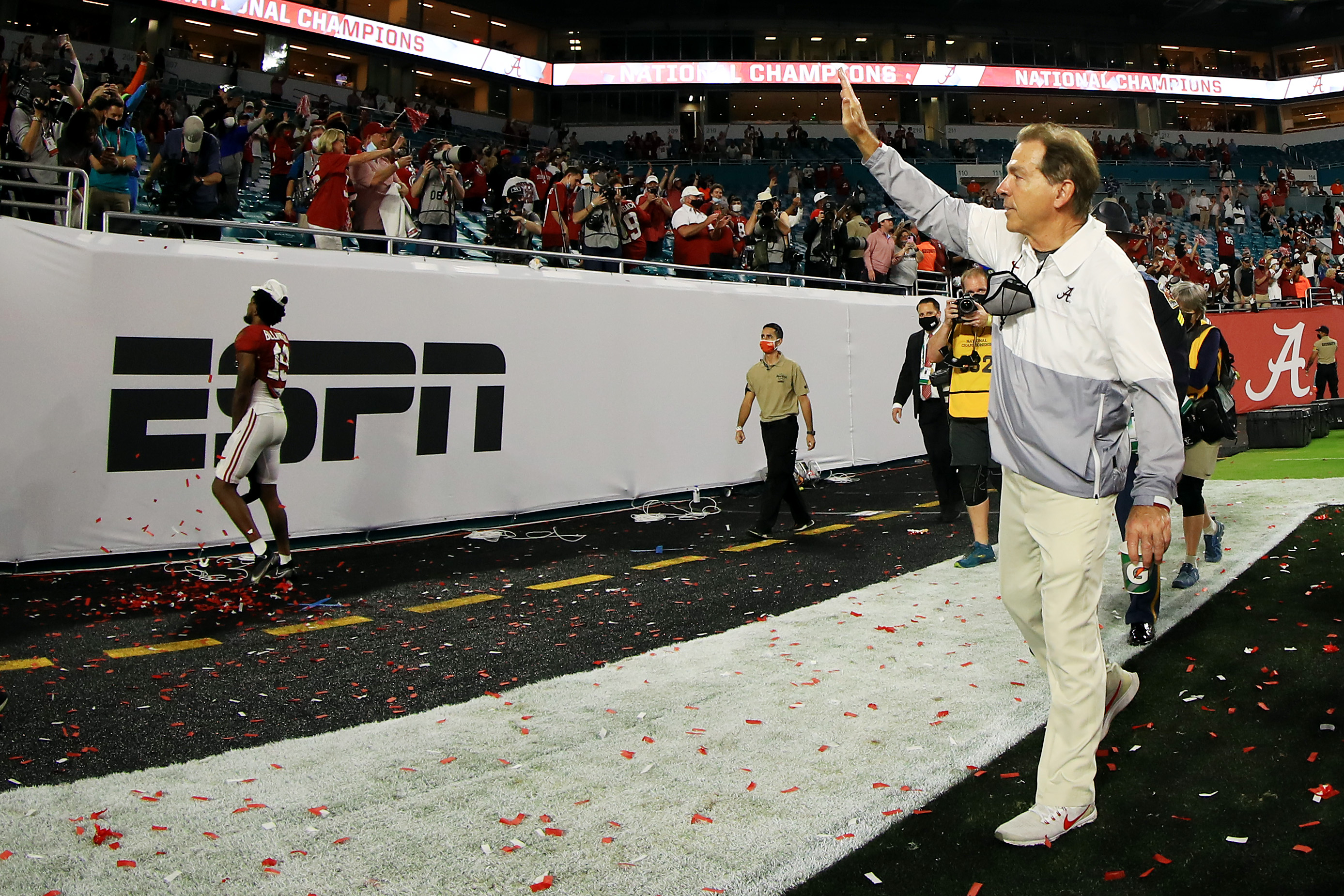 Head coach Nick Saban of the Alabama Crimson Tide gestures to fans