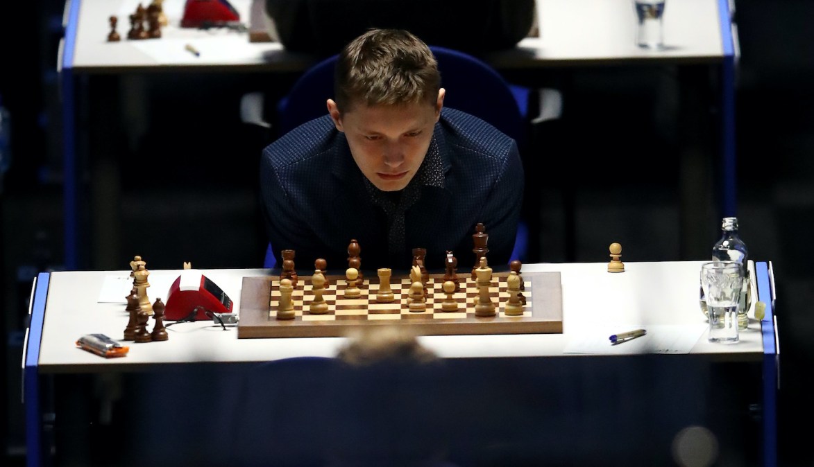 BEVERWIJK, NETHERLANDS - JANUARY 21: Andrey Evgenyevich Esipenko of Russia competes against Fabiano Caruana of the United States of America during the 83rd Tata Steel Chess Tournament held in Dorpshuis De Moriaan on January 21, 2021 in Wijk aan Zee, Netherlands (Photo by Dean Mouhtaropoulos/Getty Images)