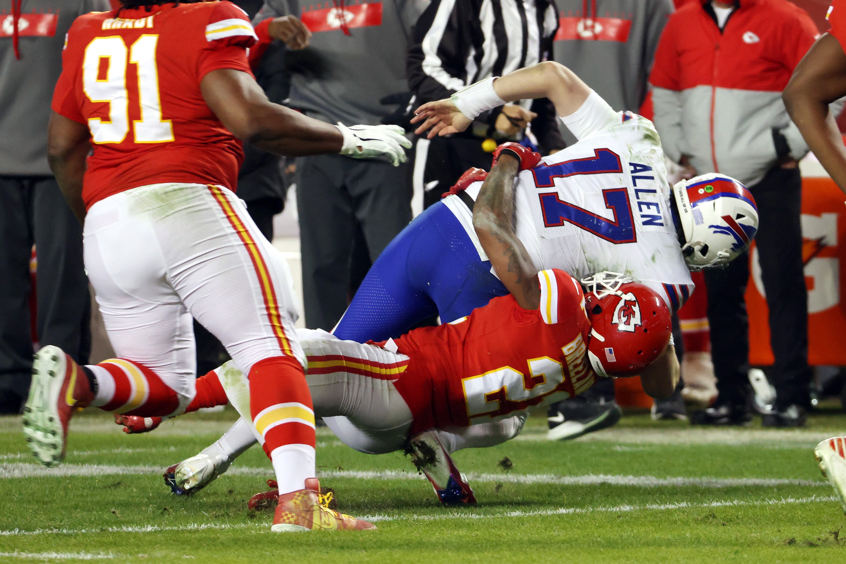 Josh Allen #17 of the Buffalo Bills is tackled by Bashaud Breeland #21 of the Kansas City Chiefs