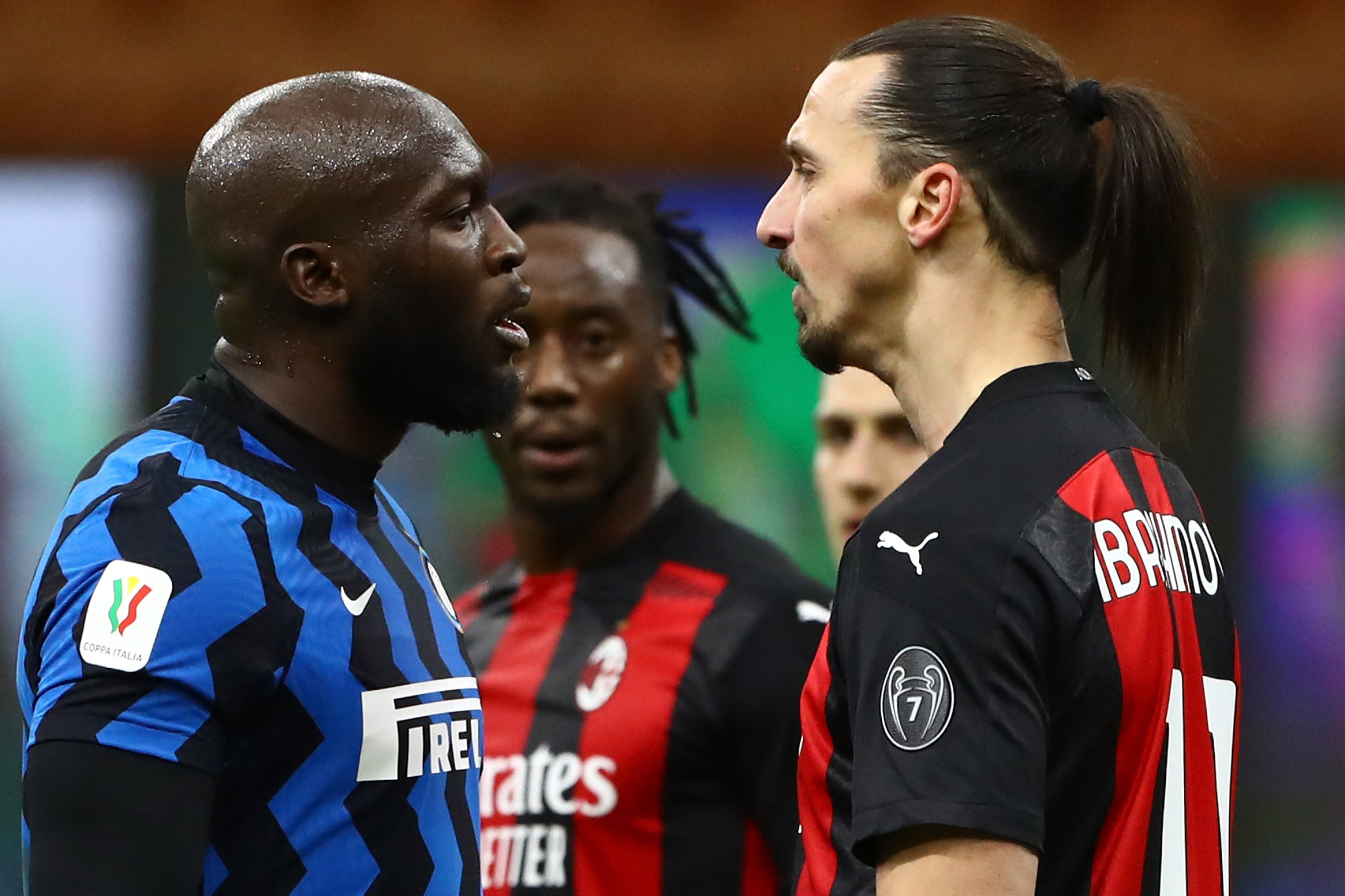 Zlatan Ibrahimovic (R) of AC Milan disputes with Romelu Lukaku (L) of FC Internazionale during the Coppa Italia match between FC Internazionale and AC Milan at Stadio Giuseppe Meazza on January 26, 2021 in Milan, Italy.