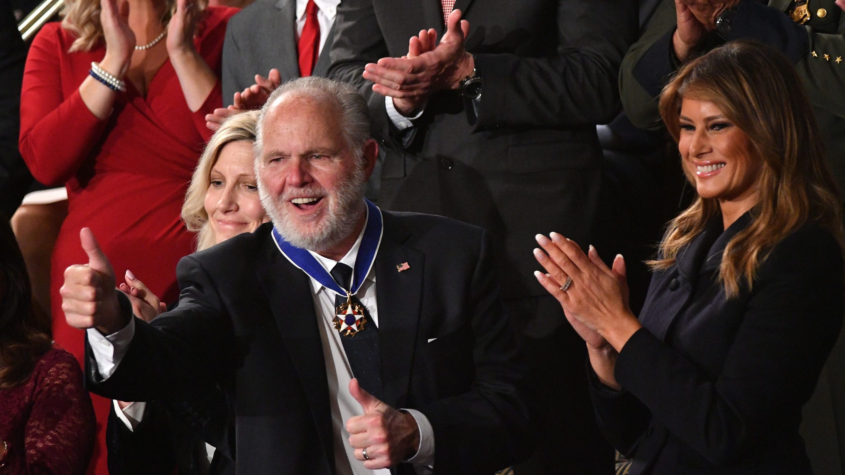 Rush Limbaugh, who has since died, celebrates after receiving the Presidential Medal of Freedom.