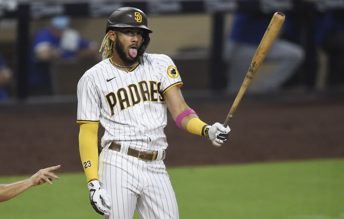 SAN DIEGO, CA - SEPTEMBER 14: Fernando Tatis Jr. #23 of the San Diego Padres reacts after taking a strike during the third inning of a baseball game against the Los Angeles Dodgers at Petco Park on September 14, 2020 in San Diego, California. (Photo by Denis Poroy/Getty Images)