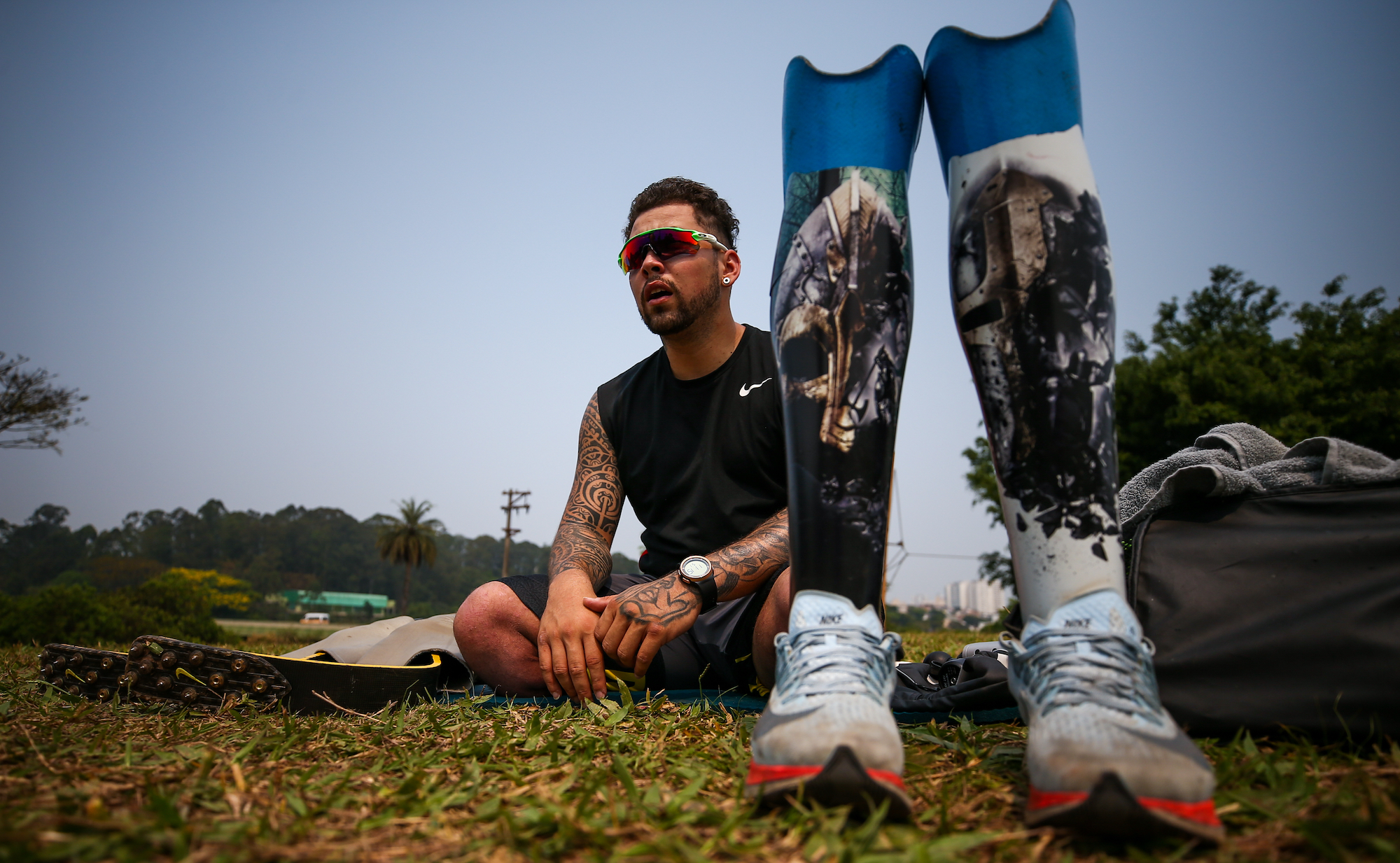 DIADEMA, BRAZIL - SEPTEMBER 19: Para Athlete Alan Fonteles Cardoso Oliveira rests during a training session at the shoulder of the Imigrantes Highway on September 19, 2020 in Diadema, Brazil. Alan had both his legs amputated below the knee since he was 21 days old. He specializes in speed tests and competes in T44 sprint events. He is a Paralympic and World Athletics Champion and will participate in his fourth Paralympics. Alan is being trained by Katsuhico Nakaya, who is going to his ninth Olympics. (Photo by Buda Mendes/Getty Images)