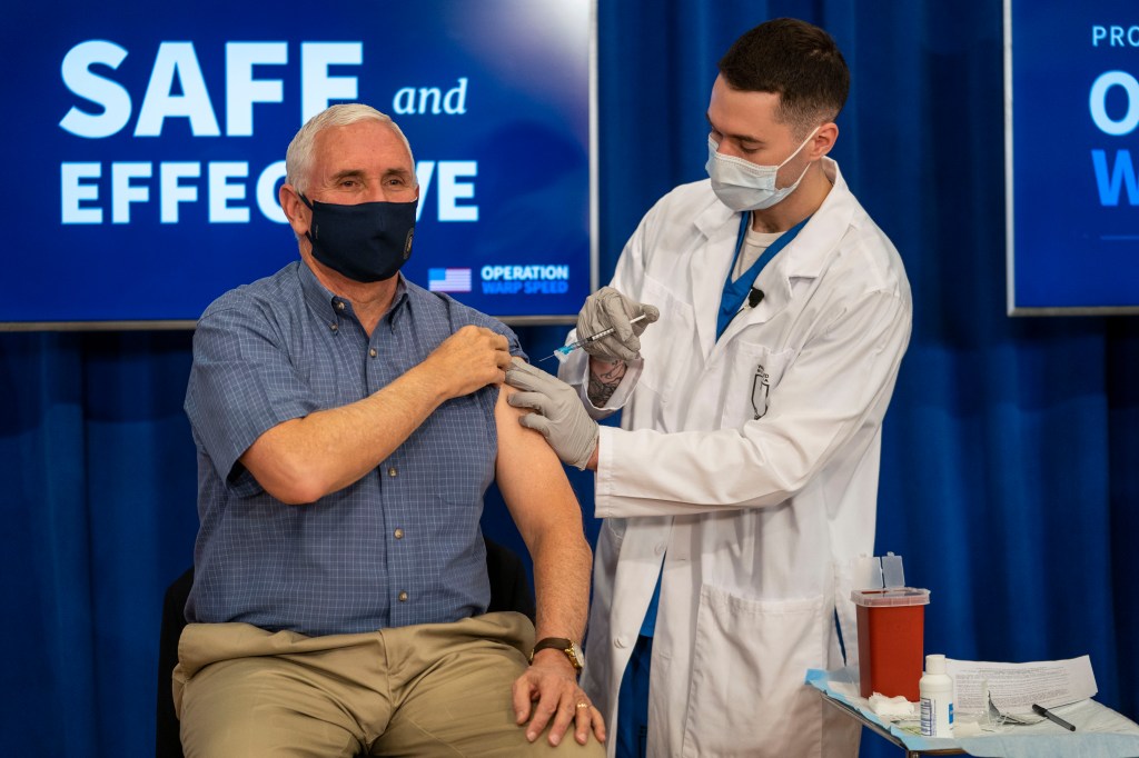 Vice President Mike Pence receives a vaccine shot.