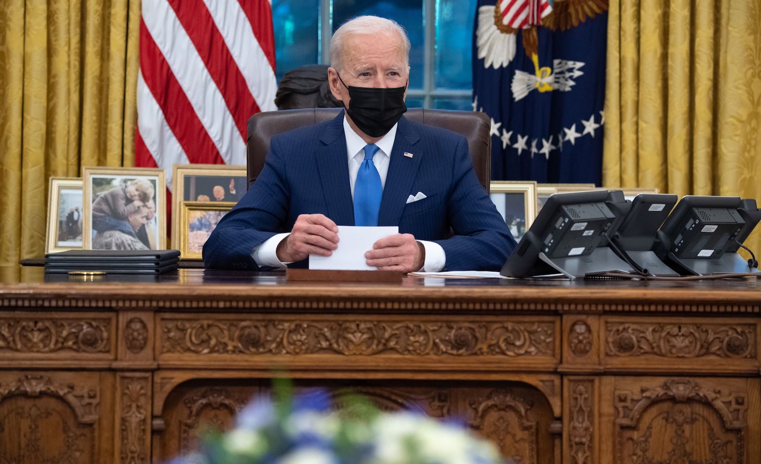 US President Joe Biden speaks before signing executive orders related to immigration in the Oval Office of the White House in Washington, DC, February 2, 2021. (Photo by SAUL LOEB / AFP) (Photo by SAUL LOEB/AFP via Getty Images)