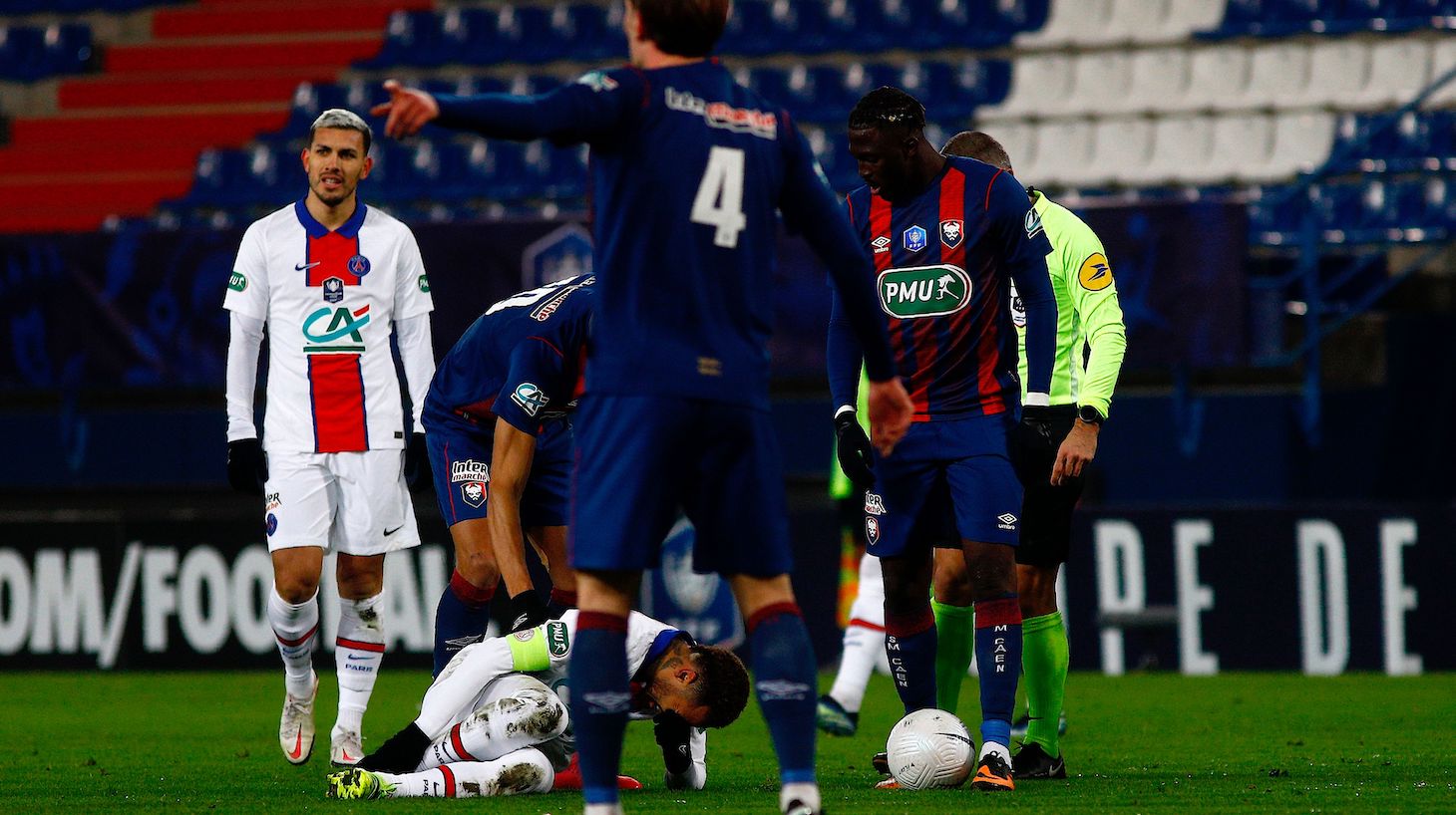 Paris Saint-Germain's Brazilian forward Neymar (3rd-L) reacts on the lawn during the French Cup round-of-64 football match between Stade Malherbe Caen and Paris Saint-Germain at the Michel-d'Ornano Stadium in Caen, northwestern France on February 10, 2021.