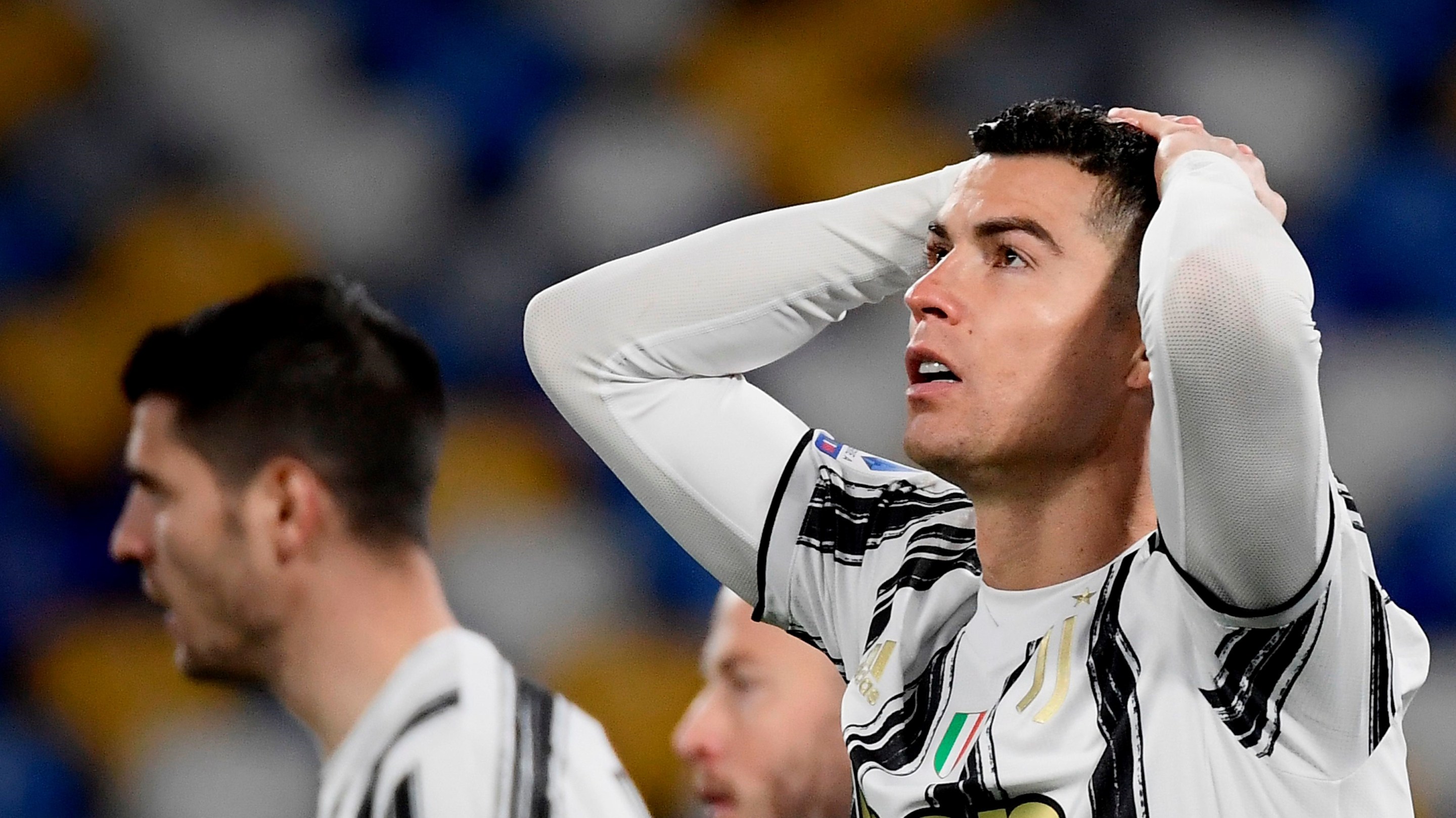 Juventus' Portuguese forward Cristiano Ronaldo reacts after missing a goal opportunity during the Italian Serie A football match Napoli vs Juventus on February 13, 2021 at the Diego Maradona (San Paolo) stadium in Naples.