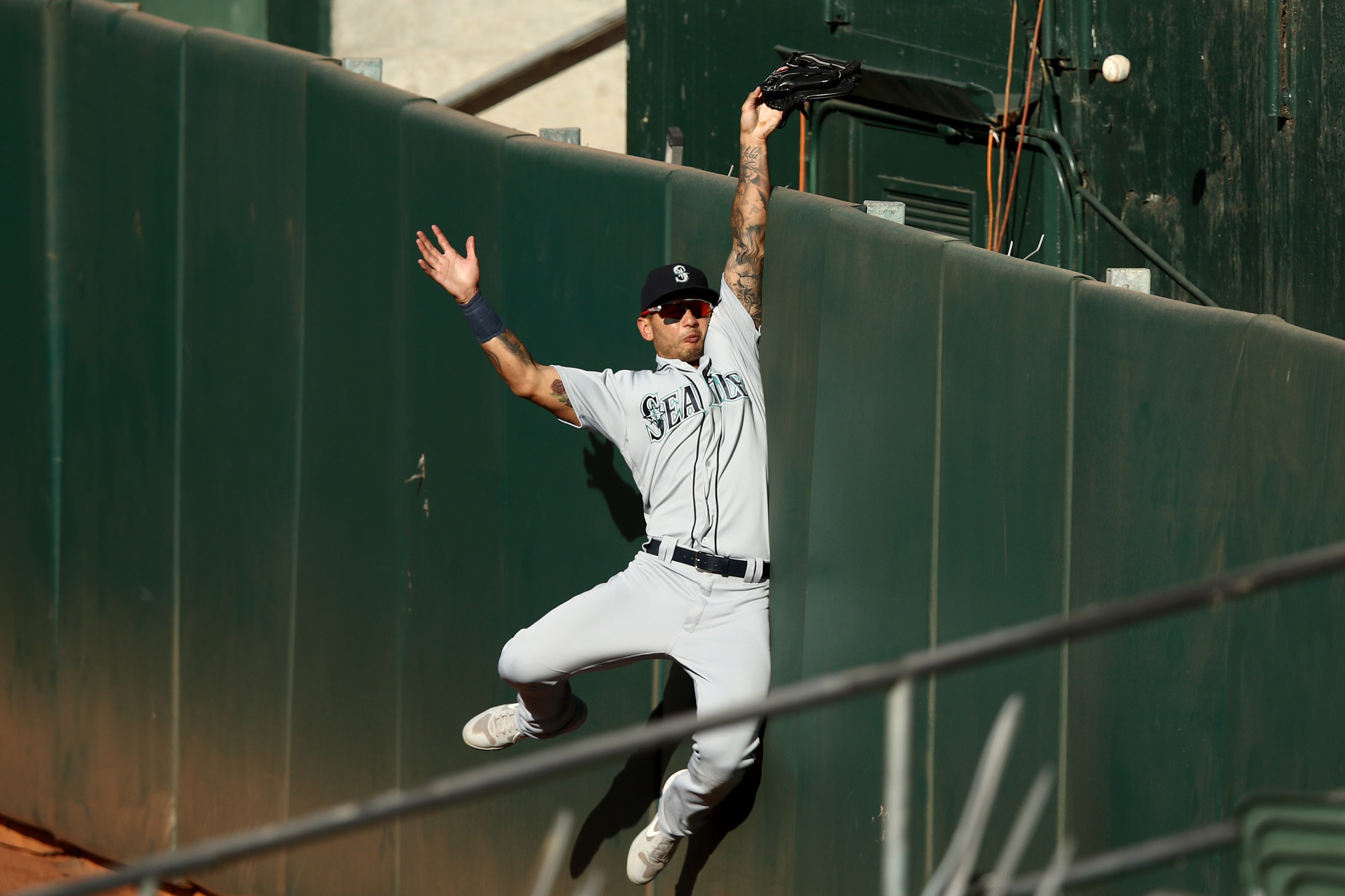 Mariners outfield Tim Lopes can't catch a homer, just as Kevin Mather couldn't quite grasp how to shut up.