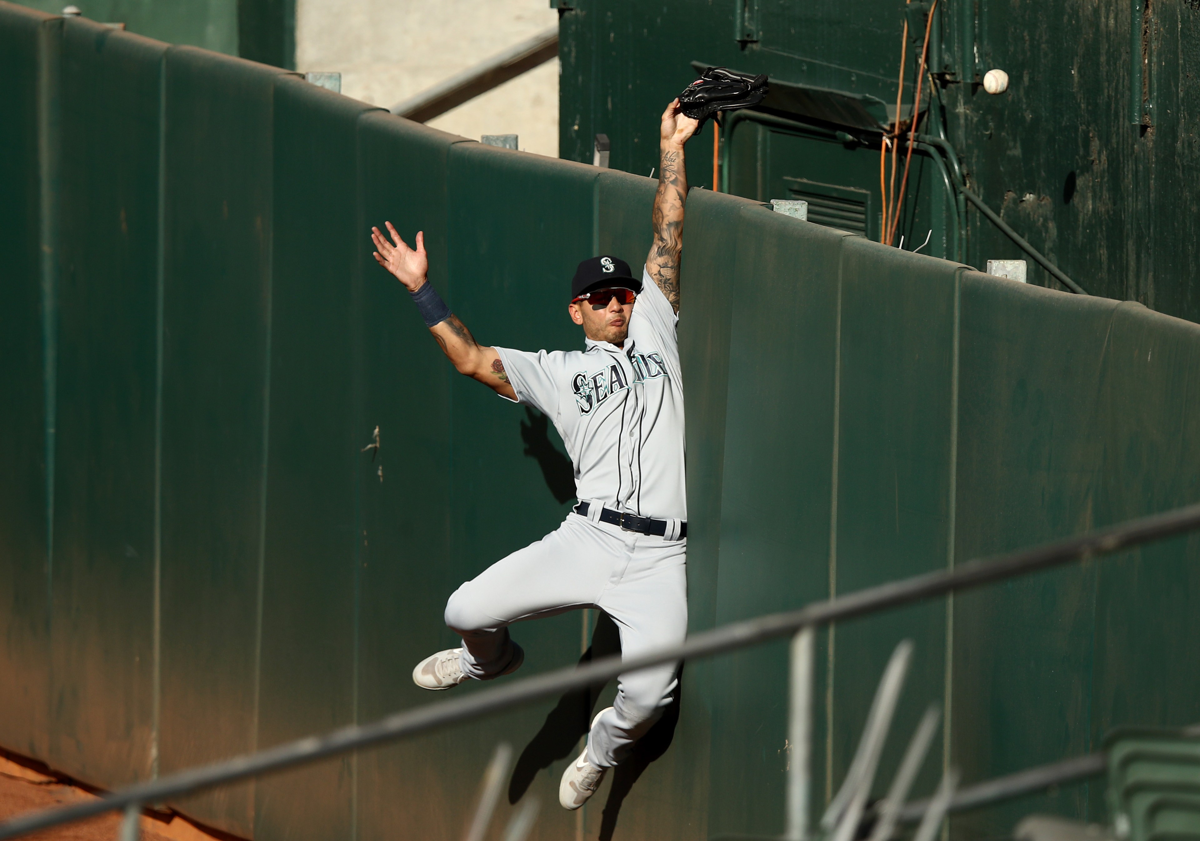 Mariners outfield Tim Lopes can't catch a homer, just as Kevin Mather couldn't quite grasp how to shut up.