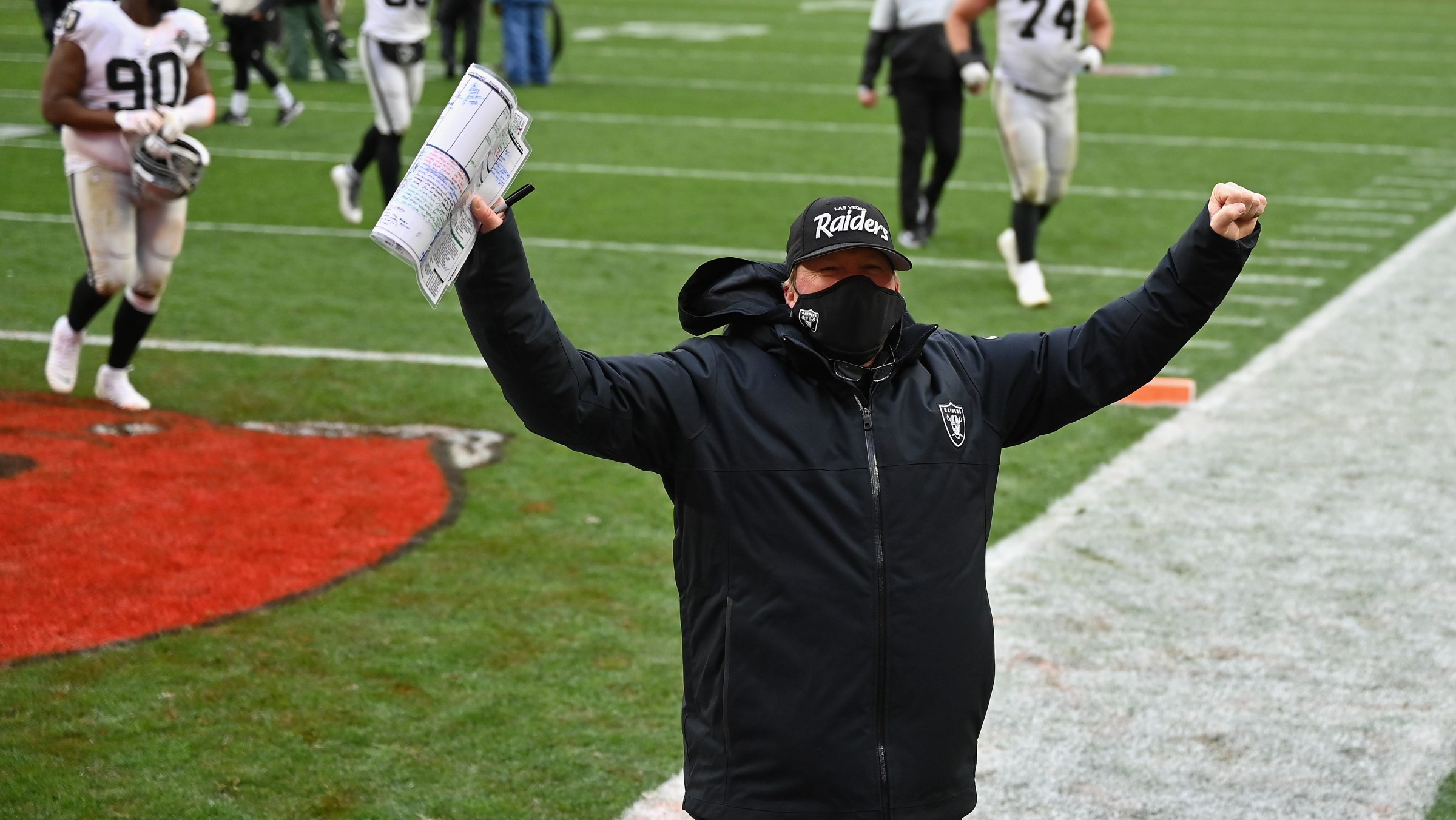 CLEVELAND, OHIO - NOVEMBER 01: Head coach Jon Gruden of the Las Vegas Raiders celebrates a victory as he walks off the field following the NFL game against the Cleveland Browns at FirstEnergy Stadium on November 01, 2020 in Cleveland, Ohio. (Photo by Jamie Sabau/Getty Images)