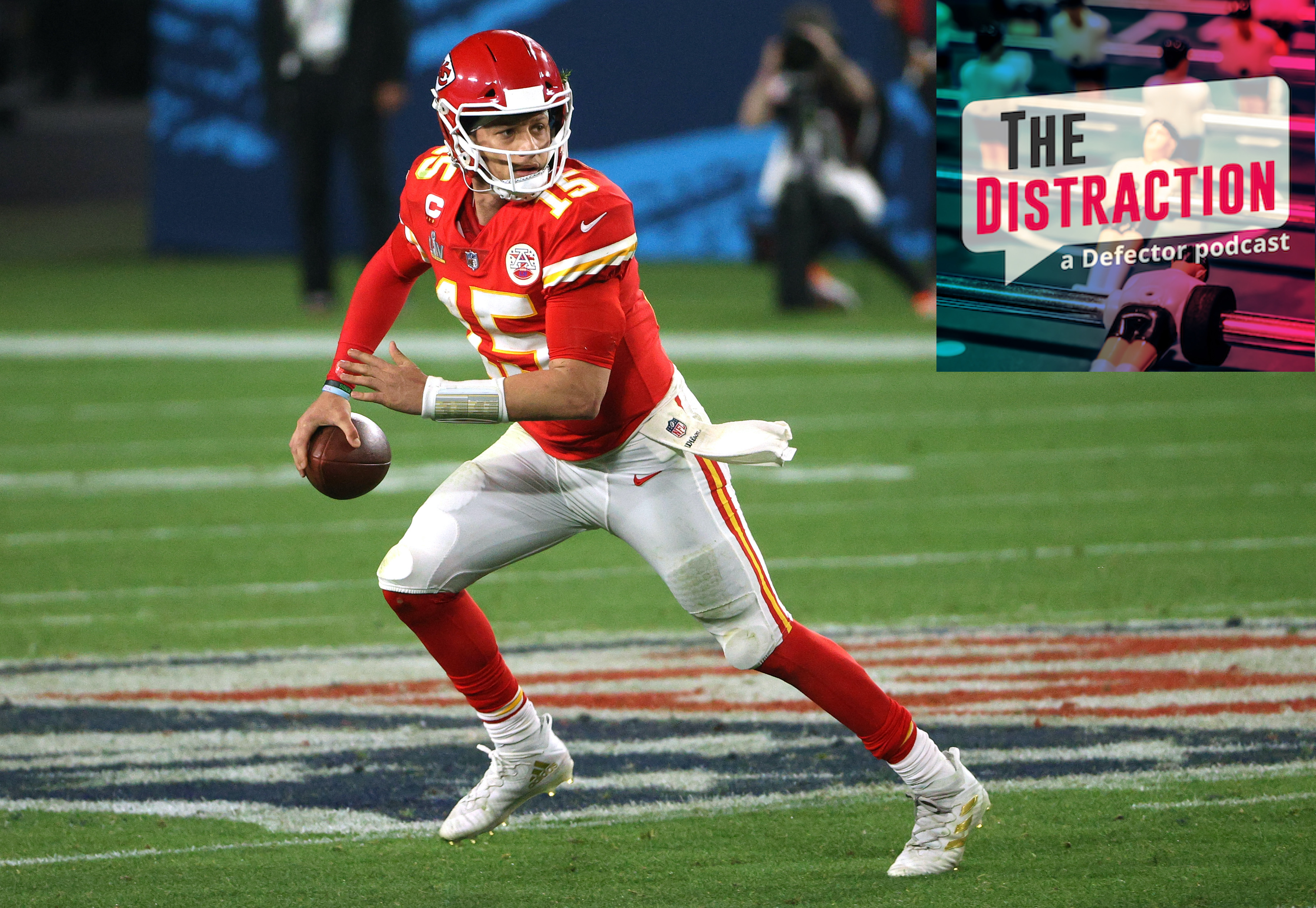 Patrick Mahomes, seen here running away from The Distraction podcast logo.