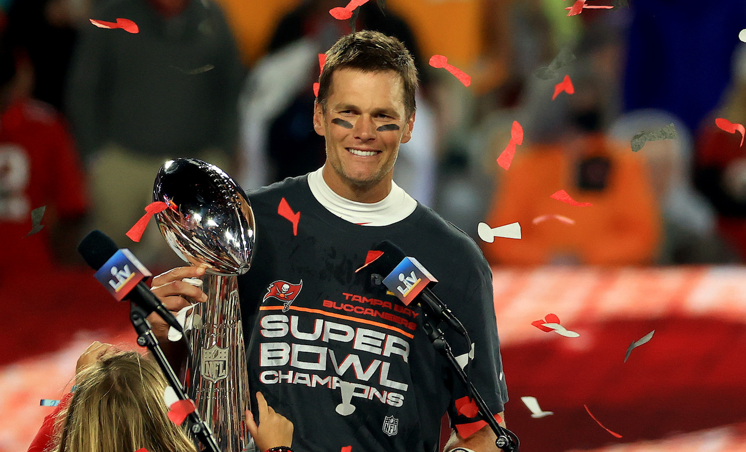TAMPA, FLORIDA - FEBRUARY 07: Tom Brady #12 of the Tampa Bay Buccaneers hoists the Vince Lombardi Trophy after winning Super Bowl LV at Raymond James Stadium on February 07, 2021 in Tampa, Florida. The Buccaneers defeated the Chiefs 31-9. (Photo by Mike Ehrmann/Getty Images)