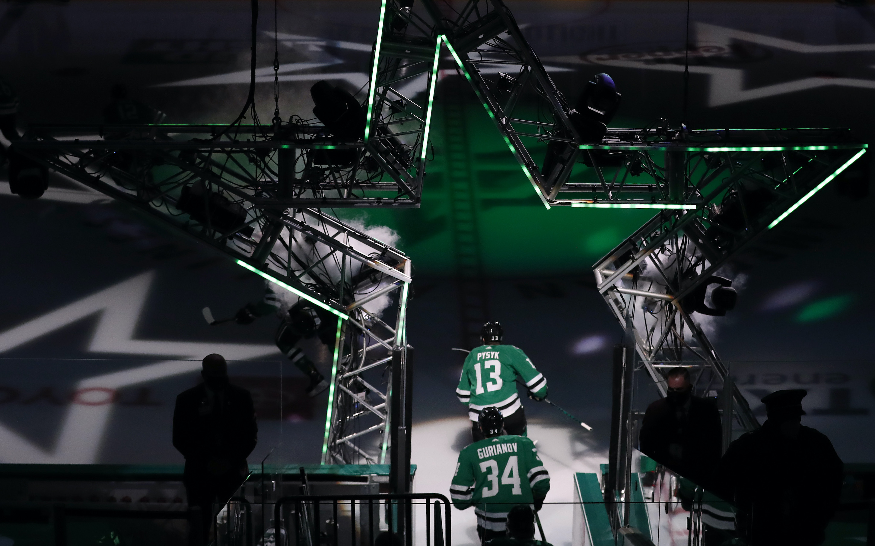 Mark Pysyk #13 of the Dallas Stars and Denis Gurianov #34 of the Dallas Stars take the ice against the Chicago Blackhawks at American Airlines Center on February 09, 2021 in Dallas, Texas.