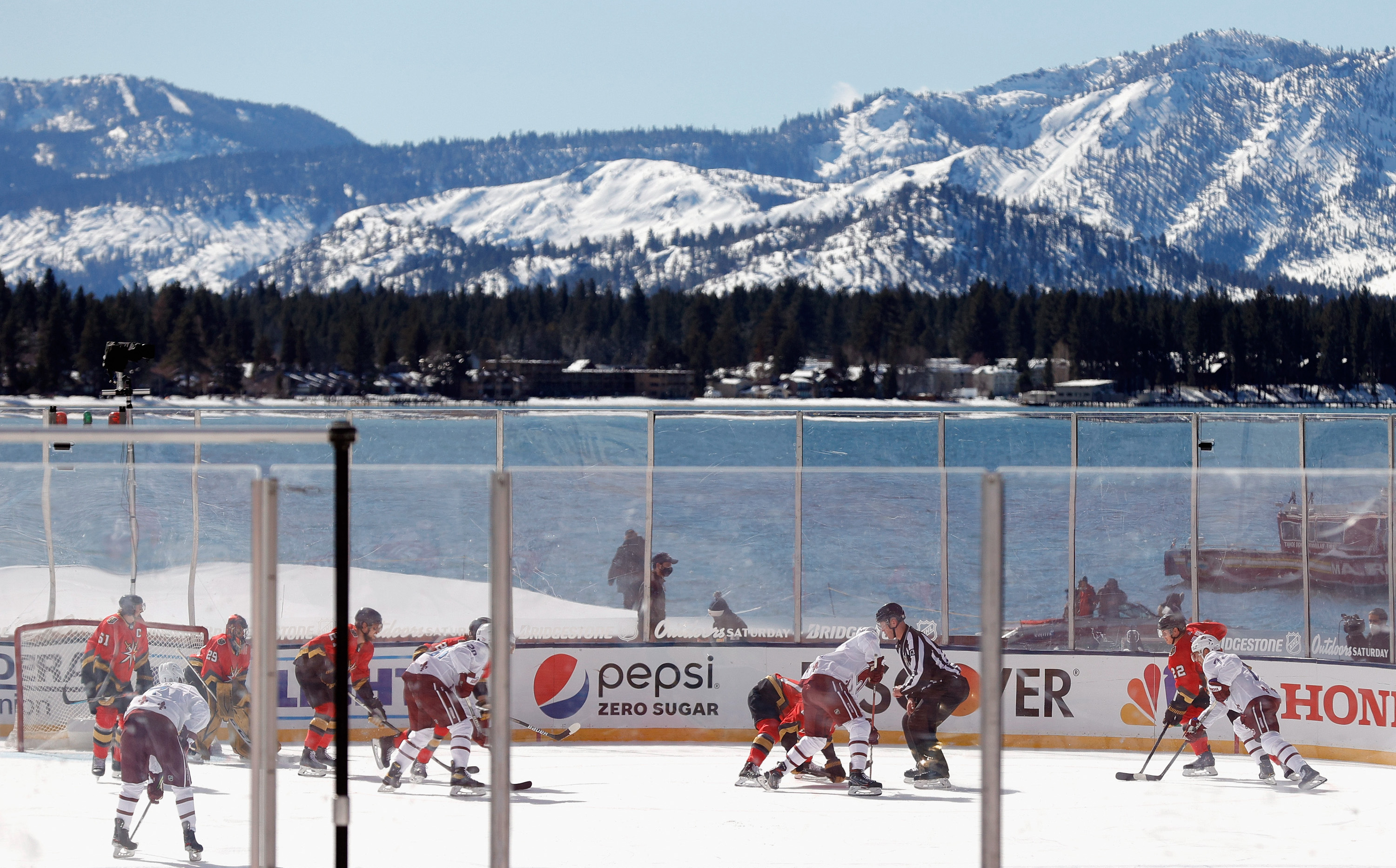 STATELINE, NEVADA - FEBRUARY 20: The Vegas Golden Knights skate against the Colorado Avalanche during the NHL Outdoors at Lake Tahoe at the Edgewood Tahoe Resort on February 20, 2021 in Stateline, Nevada. (Photo by Ezra Shaw/Getty Images)