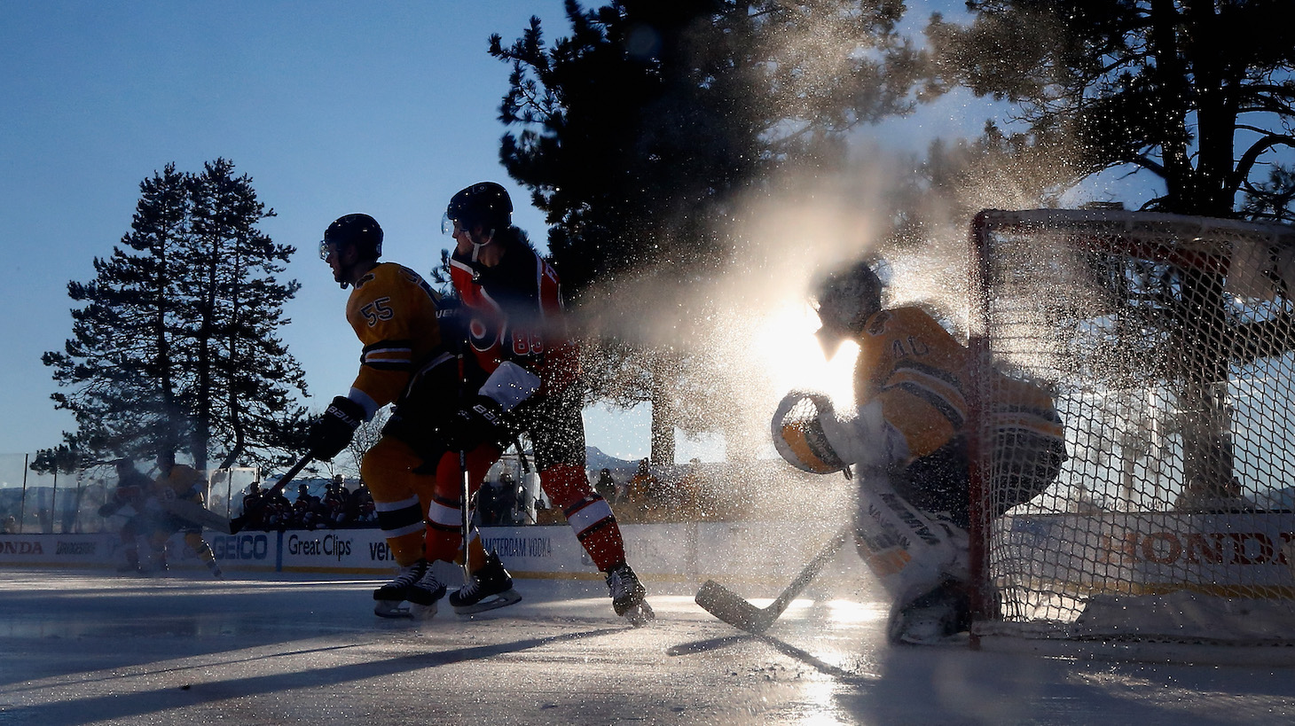 STATELINE, NEVADA - FEBRUARY 21: Goaltender Tuukka Rask #40 of the Boston Bruins follows the play as Joel Farabee #86 of the Philadelphia Flyers and Jeremy Lauzon #55 set up in front during the first period of the 'NHL Outdoors At Lake Tahoe' at the Edgewood Tahoe Resort on February 21, 2021 in Stateline, Nevada. The Bruins defeated the Flyers 7-3. (Photo by Christian Petersen/Getty Images)