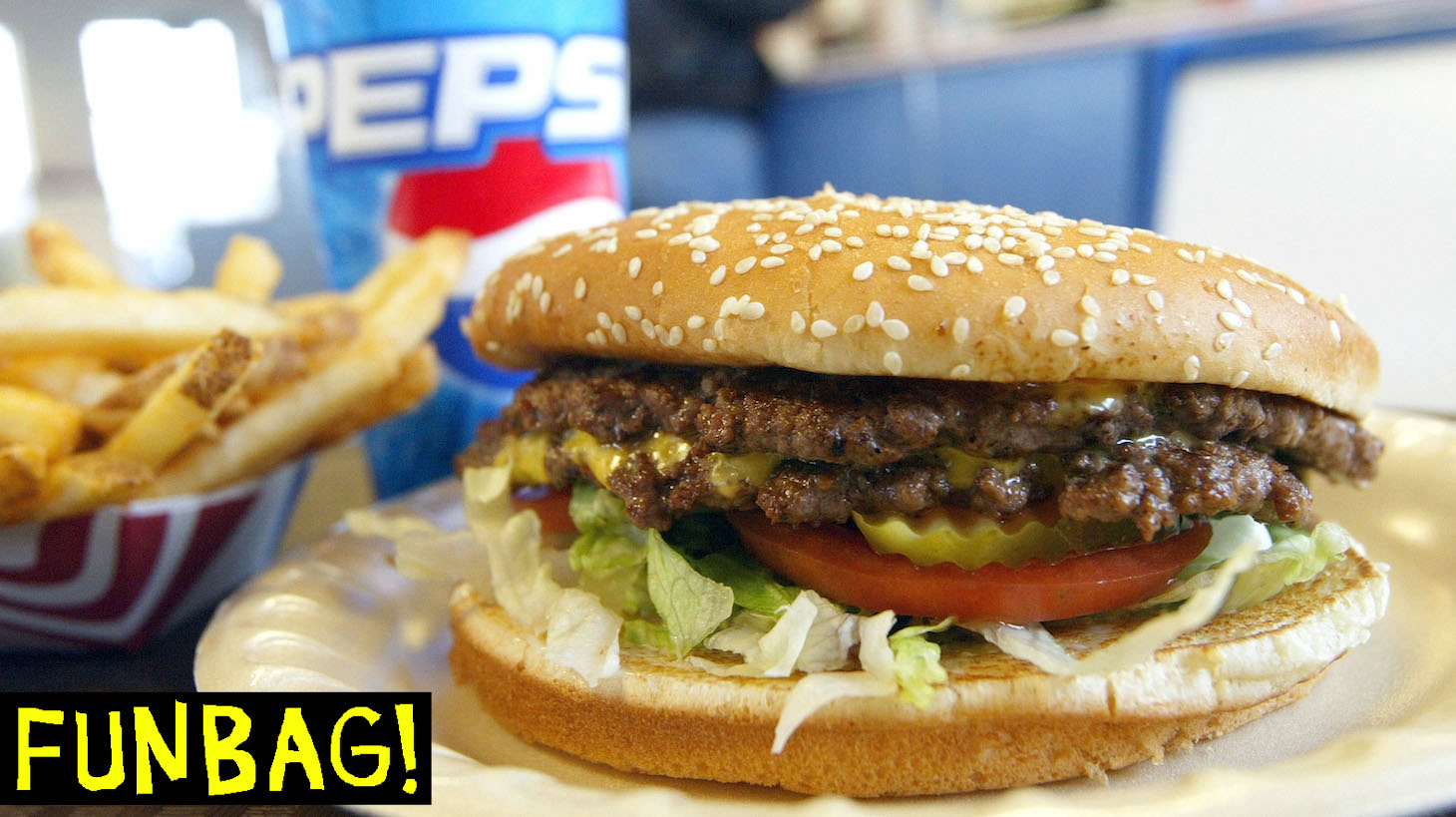 YAKIMA, WA - DECEMBER 28: A double cheeseburger, fries and soda lie on a table at Majors Hamburgers December 28, 2003 in Yakima, Washington. Two farms have been quarantined in Sunnyside and Mabton, Washington by the U.S.D.A after it was determined that a cow that came from the farms had been infected with mad cow disease, the first such case in the U.S. (Photo by Justin Sullivan/Getty Images)