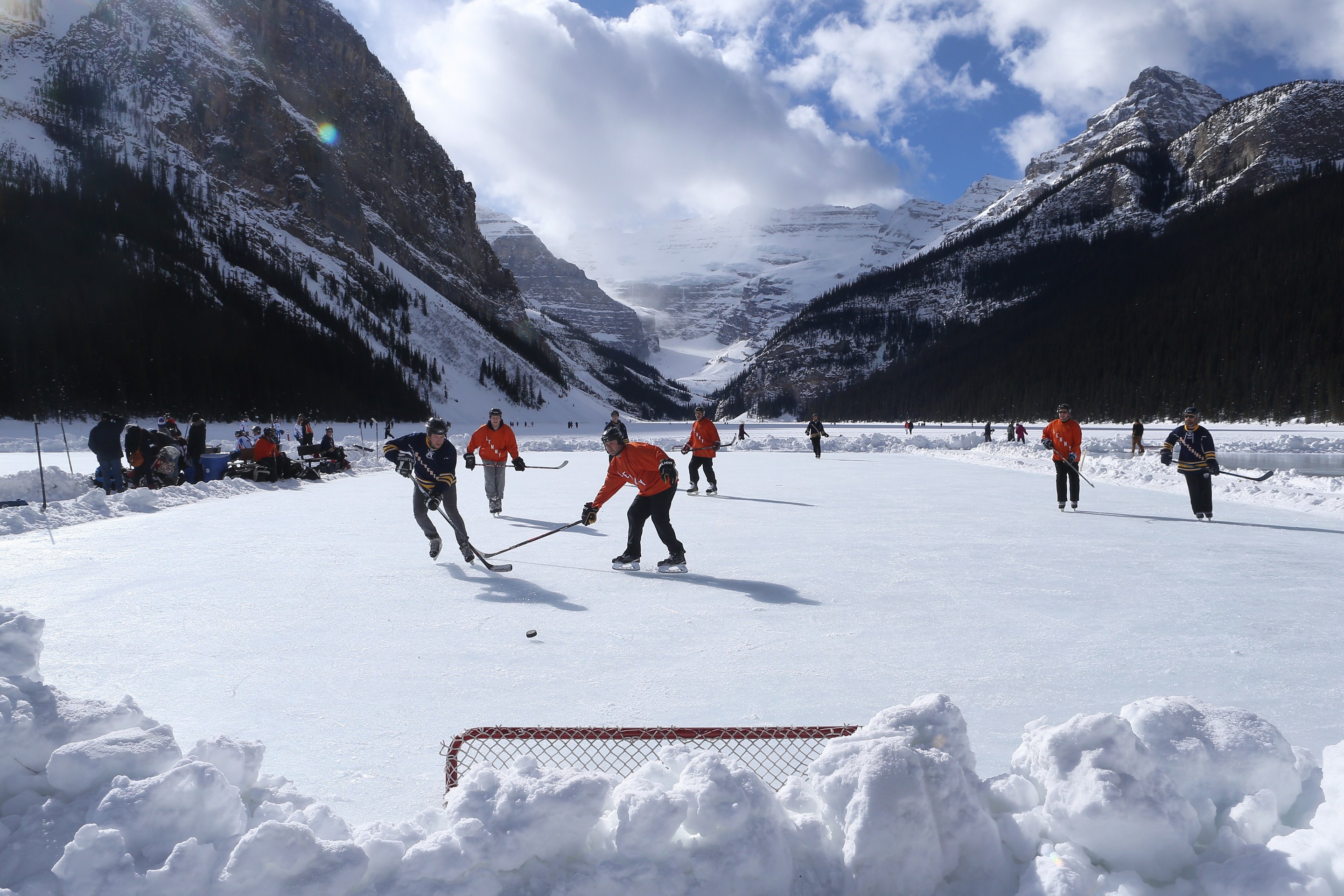 Outdoor shinny hockey action during the 7th Annual Lake Louise Pond Hockey Classic on the frozen surface of Lake Louise on February 27, 2016 in Lake Louise, Alberta, Canada.