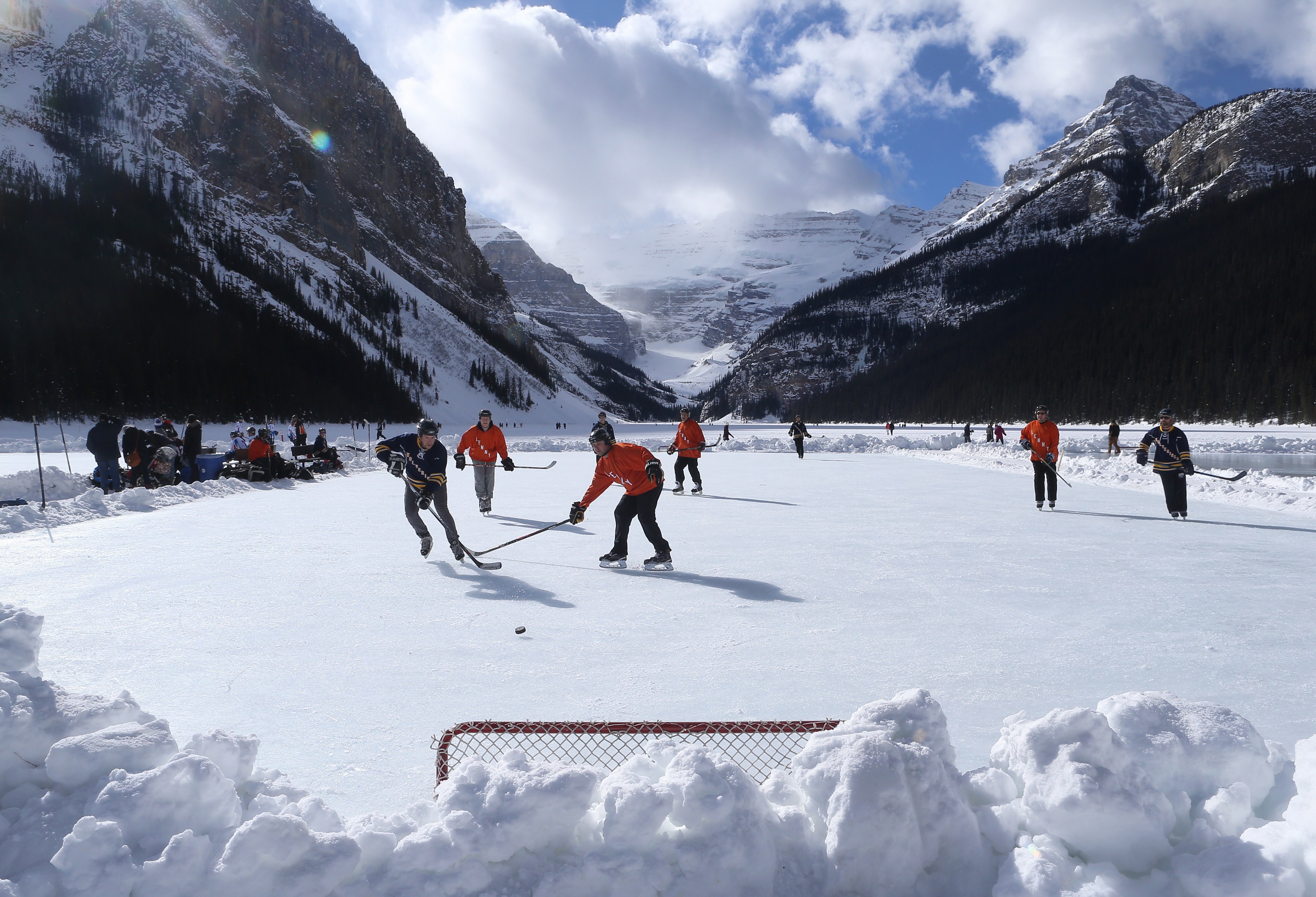 Outdoor shinny hockey action during the 7th Annual Lake Louise Pond Hockey Classic on the frozen surface of Lake Louise on February 27, 2016 in Lake Louise, Alberta, Canada.