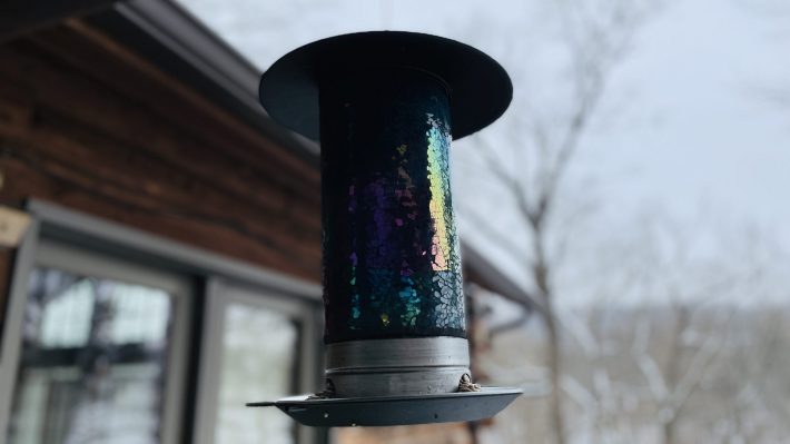 A pretty glass bird feeder
