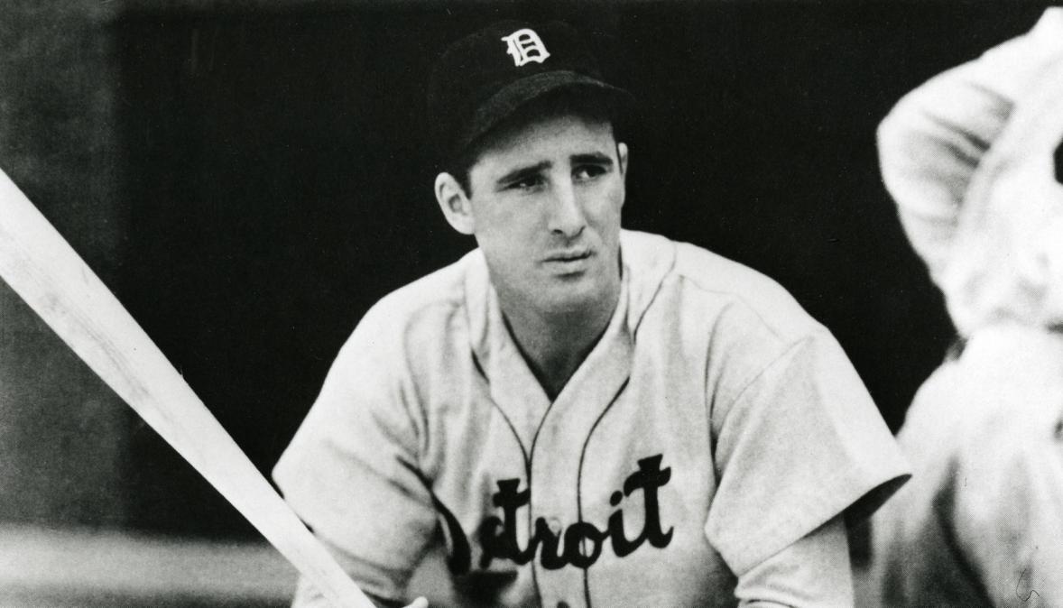 Hank Greenberg of the Detroit Tigers in dugout with bats, no date
