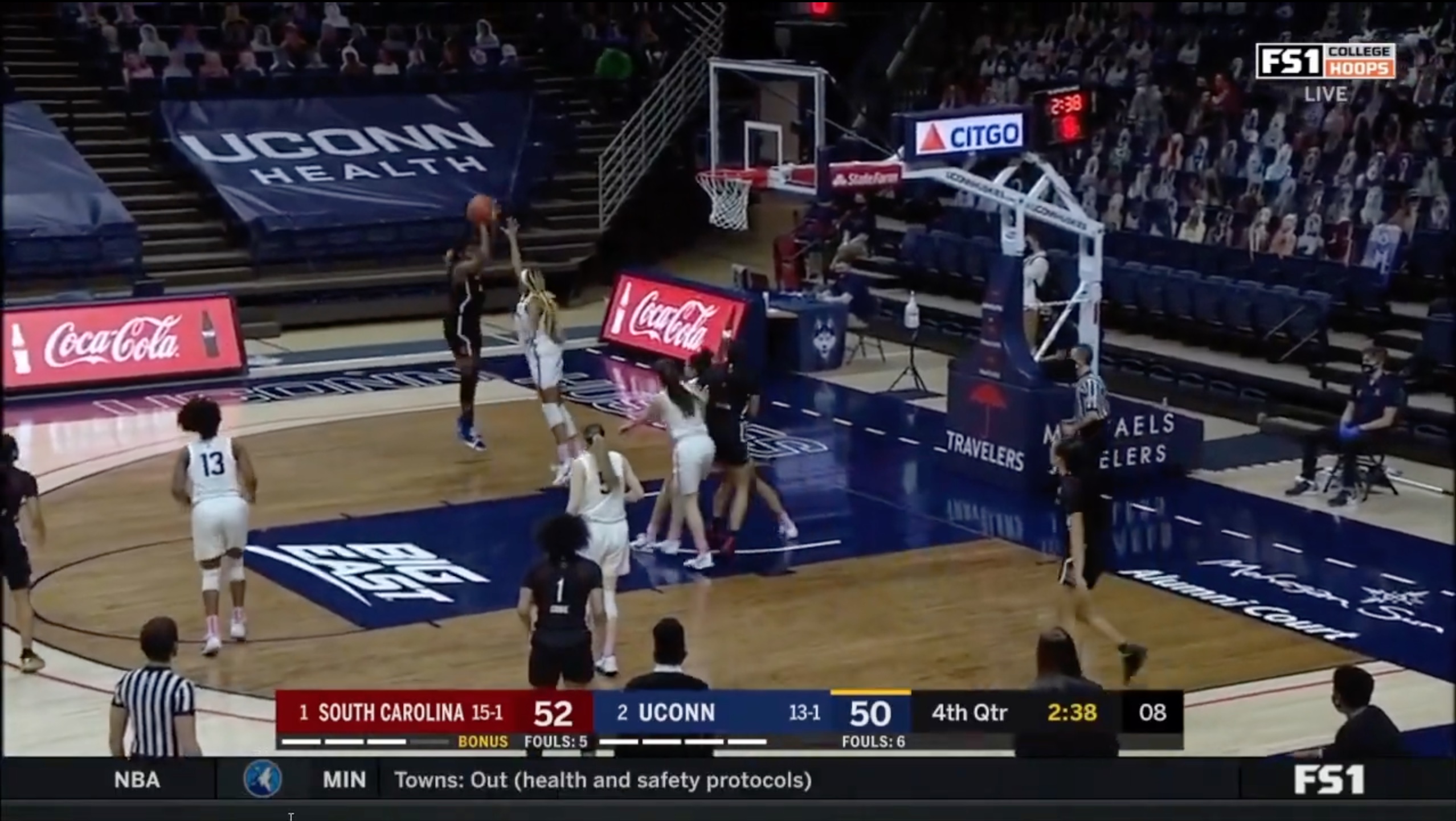 Aliyah Boston shoots over Aaliyah Edwards in South Carolina's game against UConn
